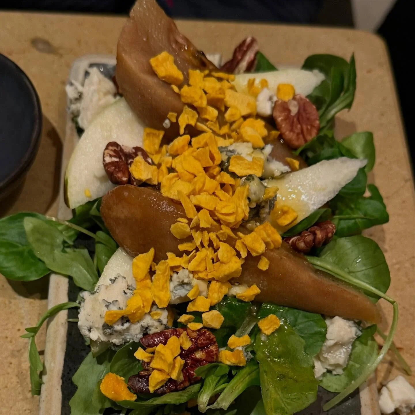 Salad Surprise.  Wanted a light dinner, had one of the best salads ever. Poached pears, ruccula, lamb&rsquo;s lettuce, roquefort, pecans and the secret ingredient on top that really made it. Any guesses? #Spainfoodie #foodie #foodtour #customtours #p