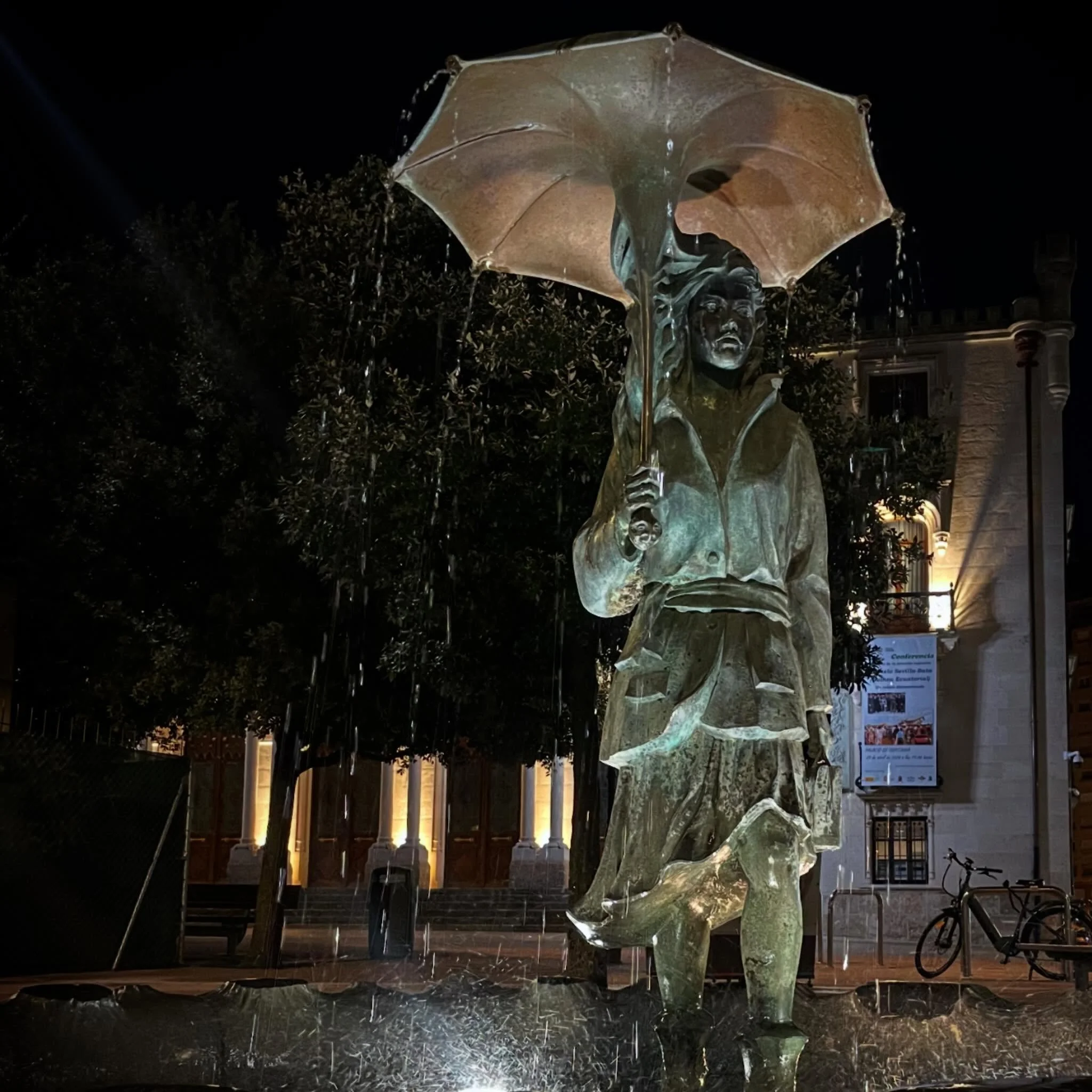 Rainy Night. Beautiful bronze fountain sculpture, appearing to rain. #NorthernSpain #Spainart #sculpture #fountain #customtours