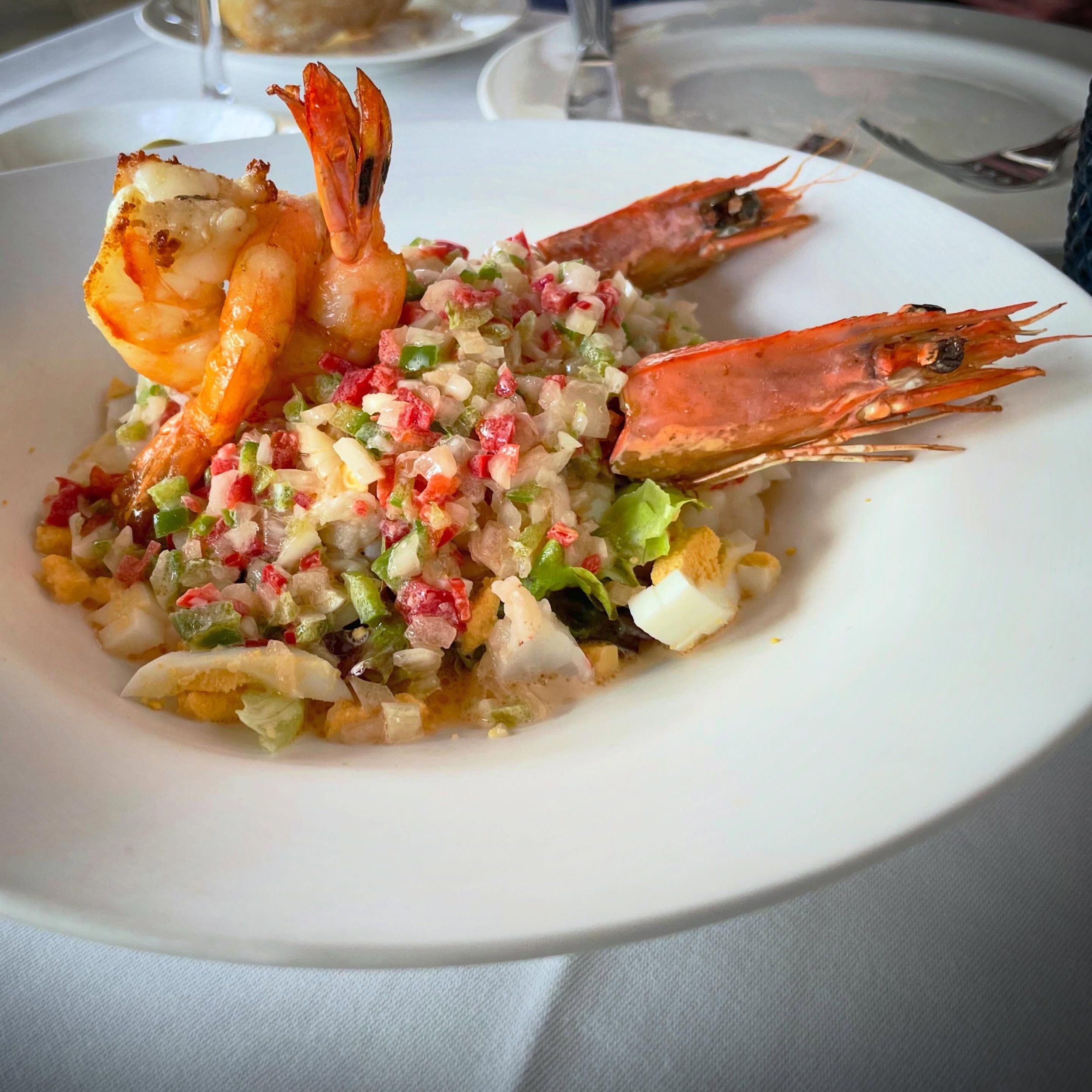 Salpicon de Marisco.  Cold seafood salad with crab, monkfish, prawns, egg and chopped veggies.  One of the best I&rsquo;ve ever had.  Seafood can vary from one place to another.  #foodie #foodtour #Spainfood #NorthernSpain #customtours