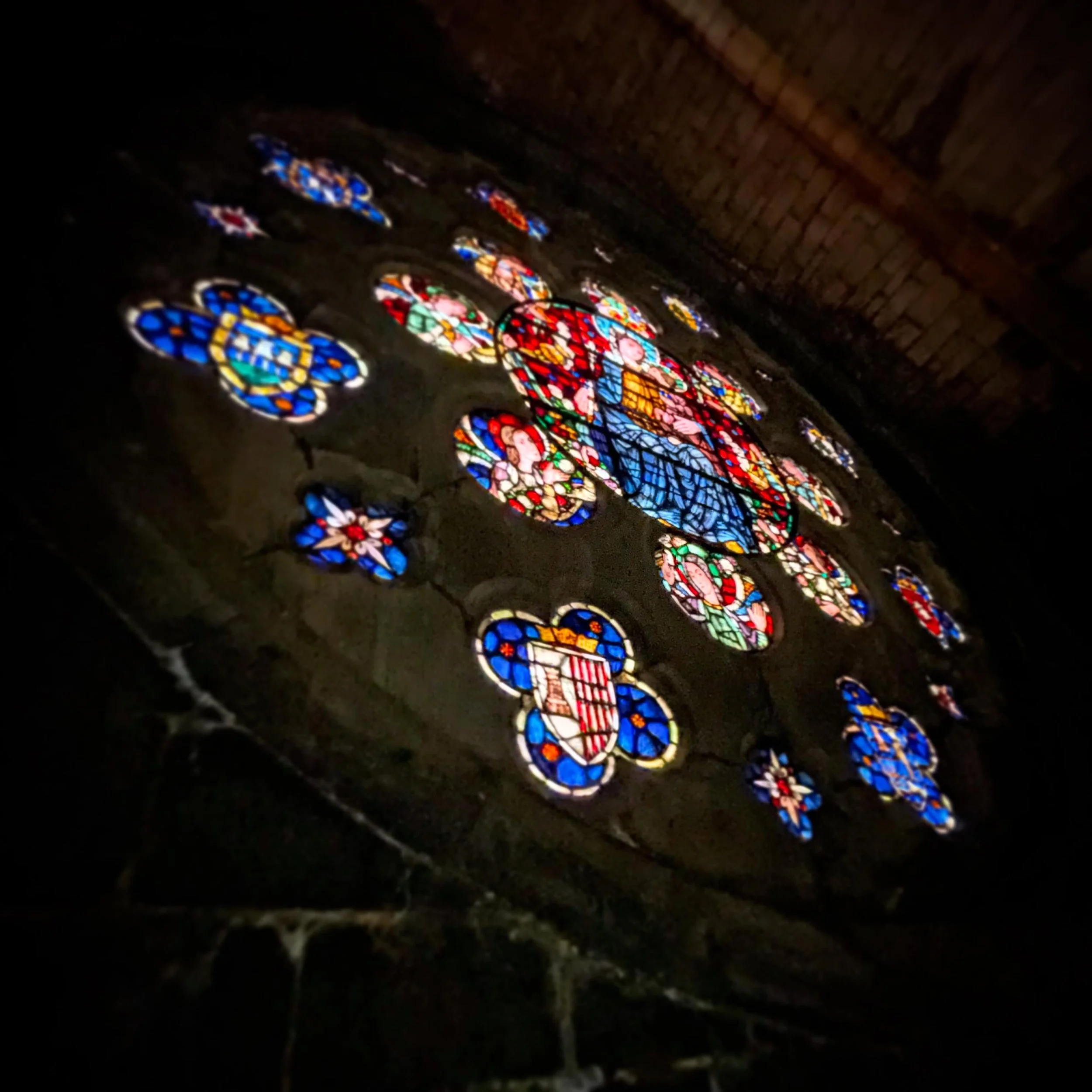 Gothic Rose.  You don&rsquo;t normally get to stand right under the rose window of important Gothic churches.  A secret door leading to the triforium of this one makes it possible. #NorthernSpain #gothicarchitecture #rosewindow #stainedglass #private