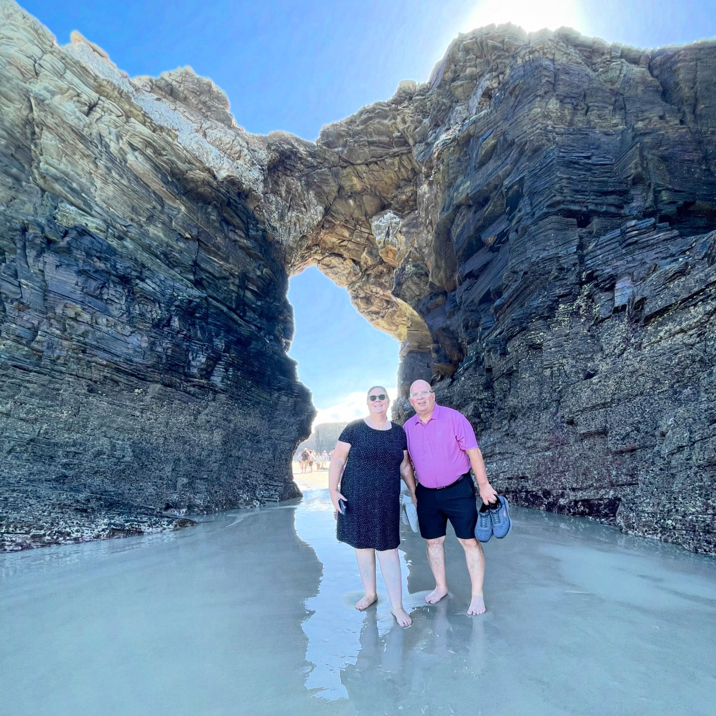 Wet Arches.  Never know how wet you will get to reach this arch, but worth a bit of sand between the toes.  #NorthernSpain #landscapephotography #rockformation #customtours #privatetour