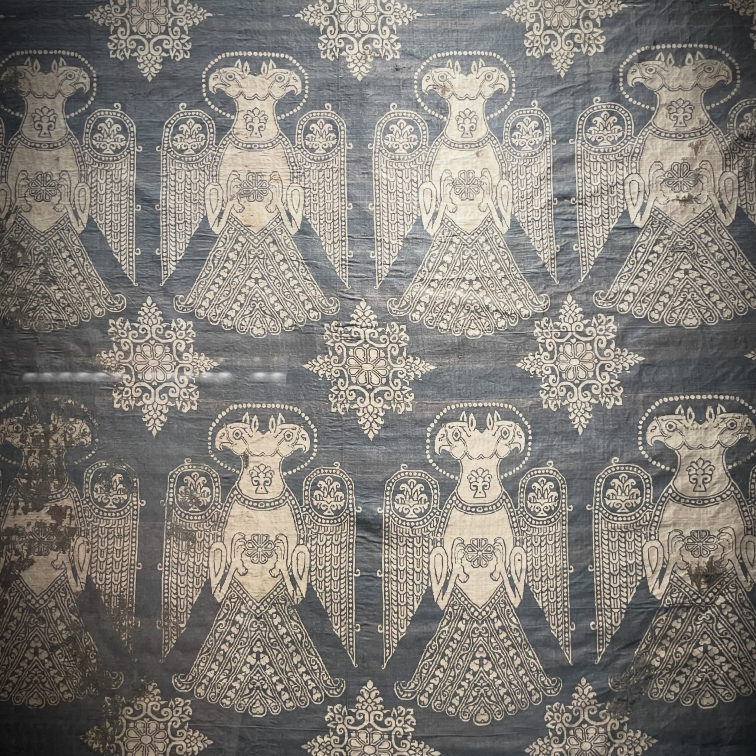 11th c. Woven Silk. &amp; Silver..Islamic origin, this and another fine silk &amp; gold cloth were found wrapping the relics of a 4th c. Christian martyr, Saint Zoilo, when they were moved from Moorish Iberia to the safety of Christian reconquered la