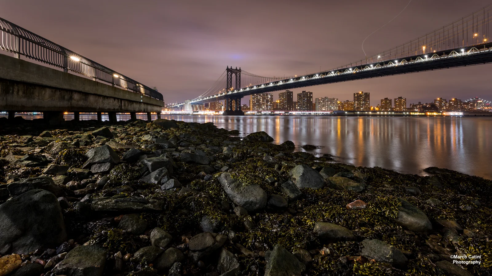 One of the fabulous images we saw created during the evening, showing the shores of the East River with the Manhattan Bridge stretching toward the bright lights of the big city. © 2016 Marco Catini, www.catini.net .