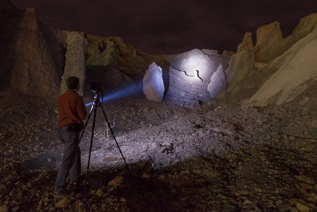 Chris using his Coast HP7R to focus on some rock formations in Death Valley's Furnace Creek area. Shooting with a Nikon F5 on his Gitzo 3541L tripodS.