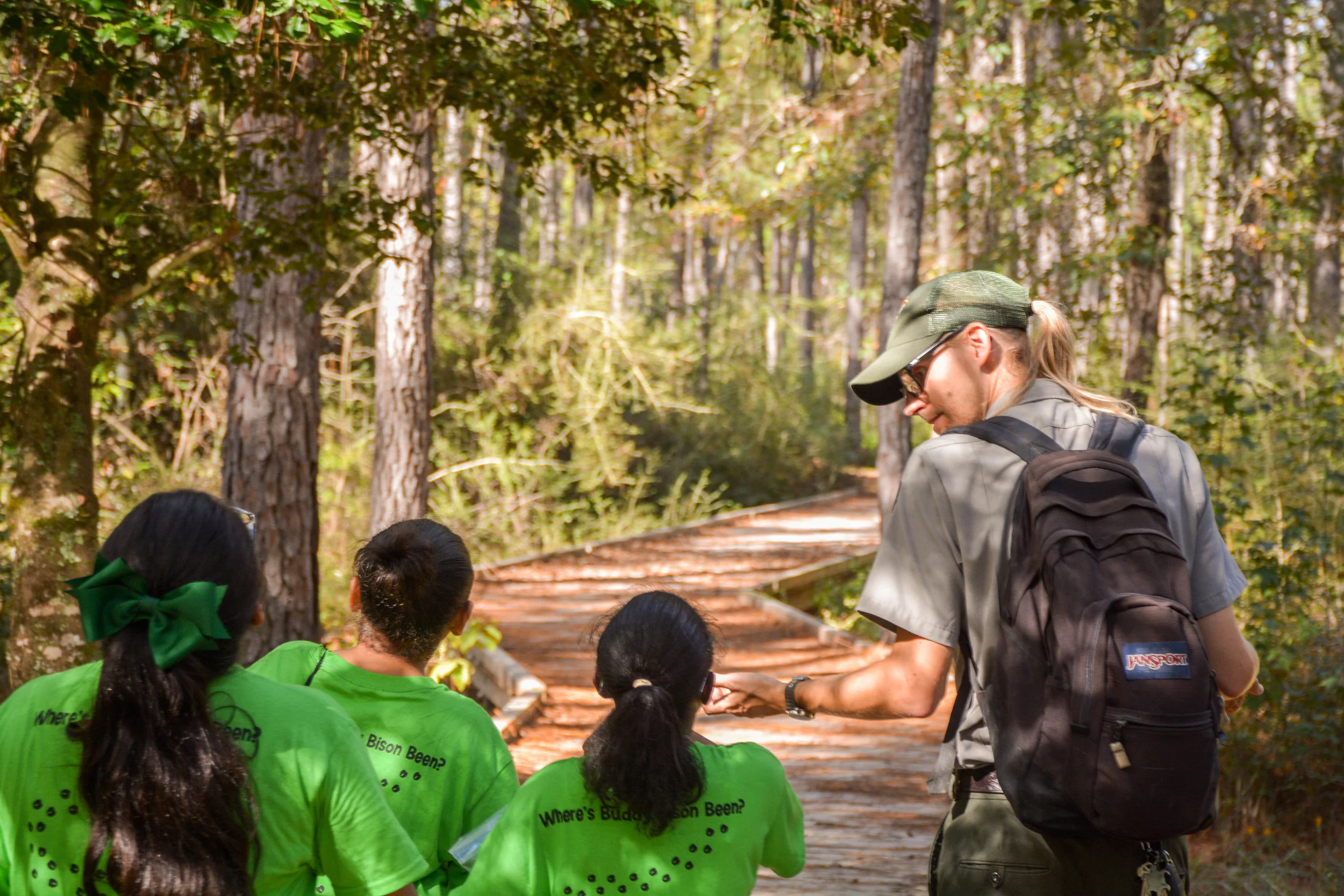 In Texas' Big Thicket National Preserve, Ranger Alex Halbrook leads and teaches school children who are part of the NPT's Buddy Bison program . The educational outreach program provides parks, wilderness and STEM opportunities to K8 kids in more than 60 schools across the U.S. Photo courtesy of the National Park Trust.