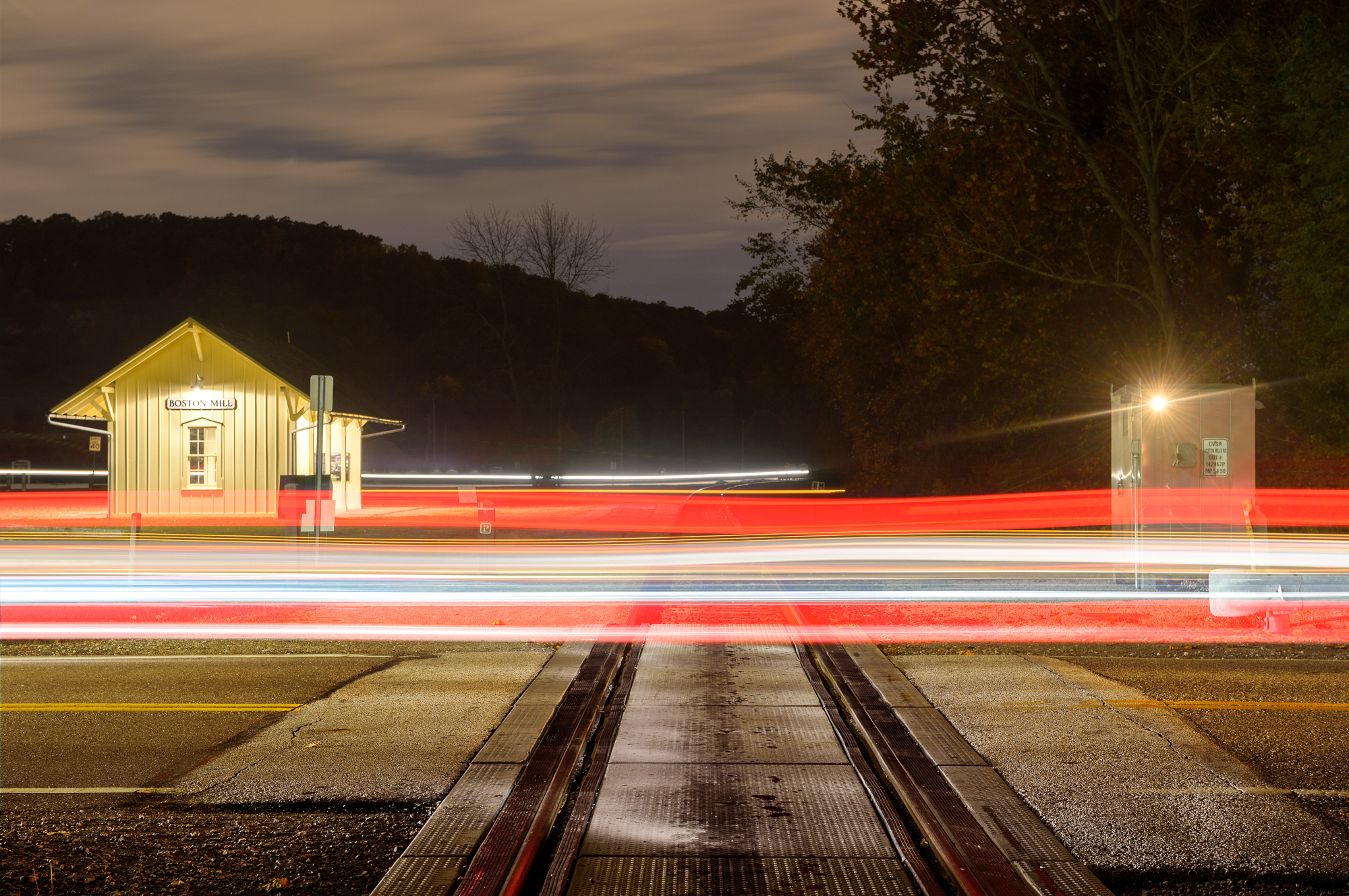 The final image of the HDR frame (four exposures combined) layered with car-trail exposures.