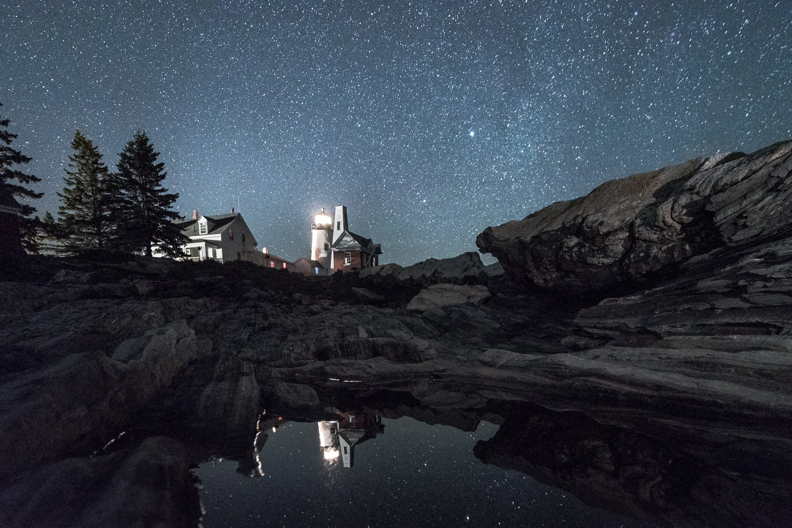 Pemaquid Point Lighthouse, Maine. This wide-angle view of the oft-photographed lighthouse shows relatively little stellar movement in the northern part of the sky on the left side of the frame, and much more to the east on the right side of the frame (see detail photos, below). Nikon D750, Zeiss 21mm f/2.8 lens. 30 seconds, f/4, ISO 6400.