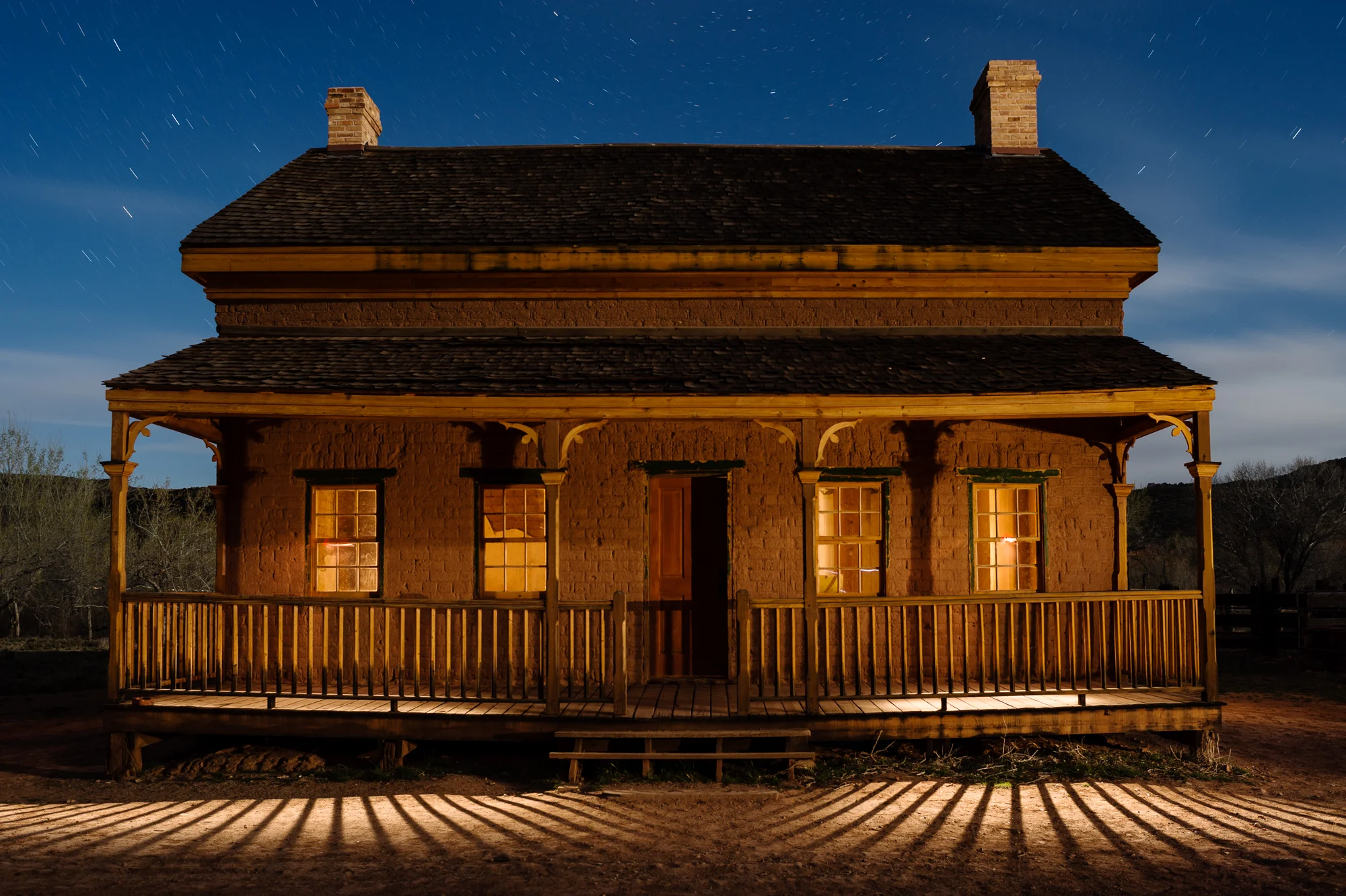 Figure 7. I love to visit Grafton ghost town during workshops in Zion National Park . On this occasion, I was teaching a night photography workshop with Gabriel Biderman. Our group was focused on shooting the night sky while light painting the various buildings.