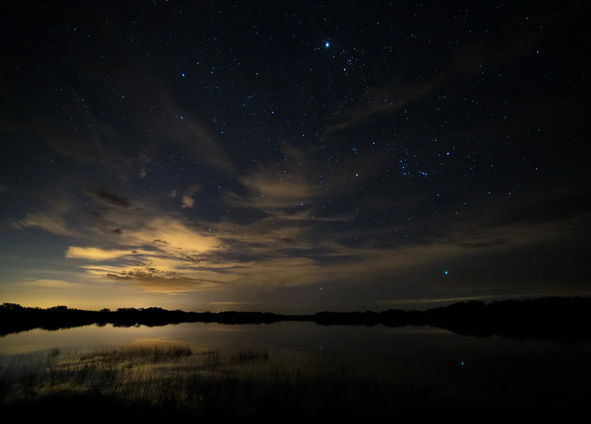 In this photo from Everglades National Park, light pollution from distant Miami builds up in a 30-second exposure to provide depth to the scene. © 2013 Chris Nicholson.
