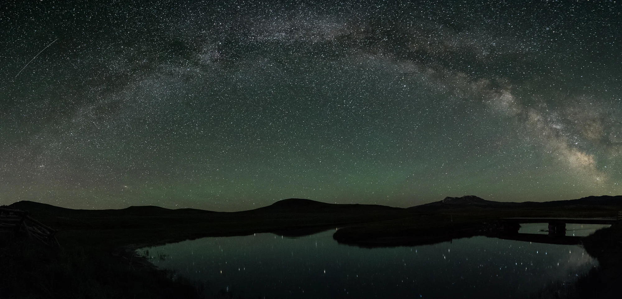 Milky Way pano over Montana. Seven stitched images shot at 30 seconds, f/4, ISO 6400. Nikon D750 with Nikkor 14-24mm f/2.8 lens at 14mm. Photo © Gabriel Biderman.