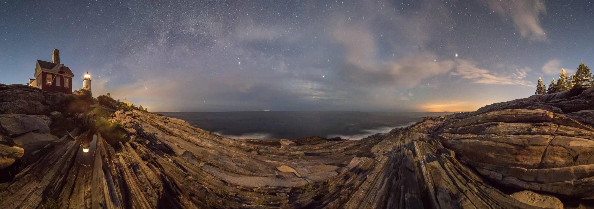 Pemaquid Point Lighthouse, Maine. 20 seconds, f/3.5, ISO 6400. Pano of six stitched frames, with clouds, Milky Way and light pollution.