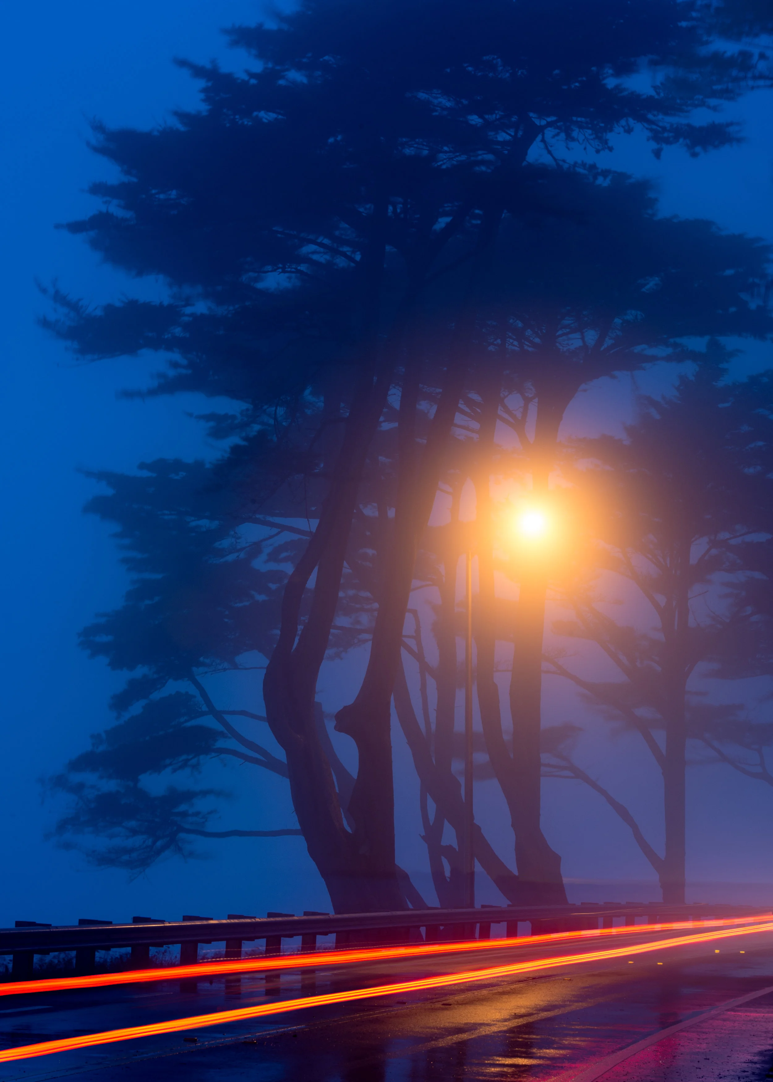 Car trails and fog at nautical twilight. Nikon D4. 4 seconds, f/16, ISO 200.