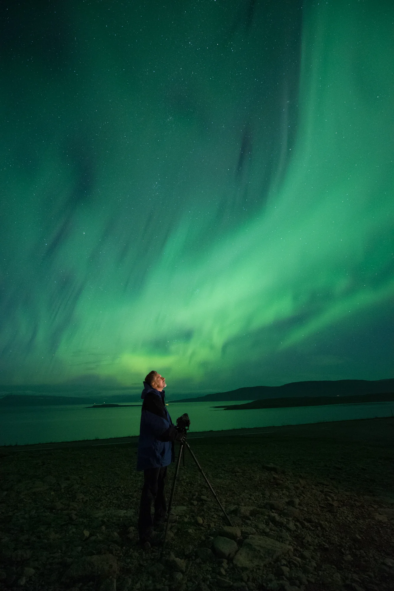 Lance under an Icelandic aurora. 4 seconds, f/2.8, ISO 6400. Nikon D750 with a 14mm lens. © Gabriel Biderman.
