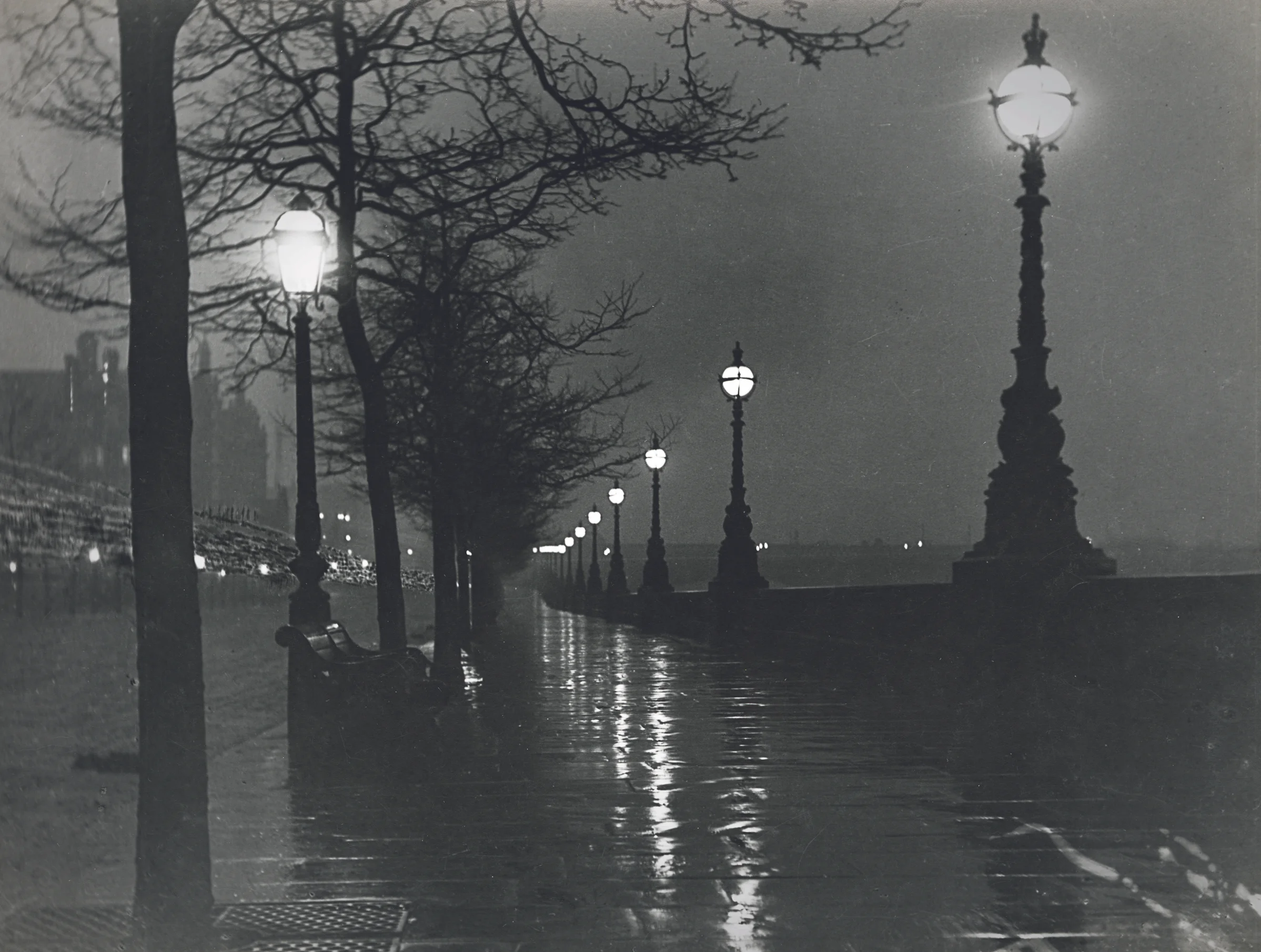 Paul Martin, "A wet night on the embankment," 1895. Martin covered his camera lens during the exposure to shield it from a curious policeman’s lantern.