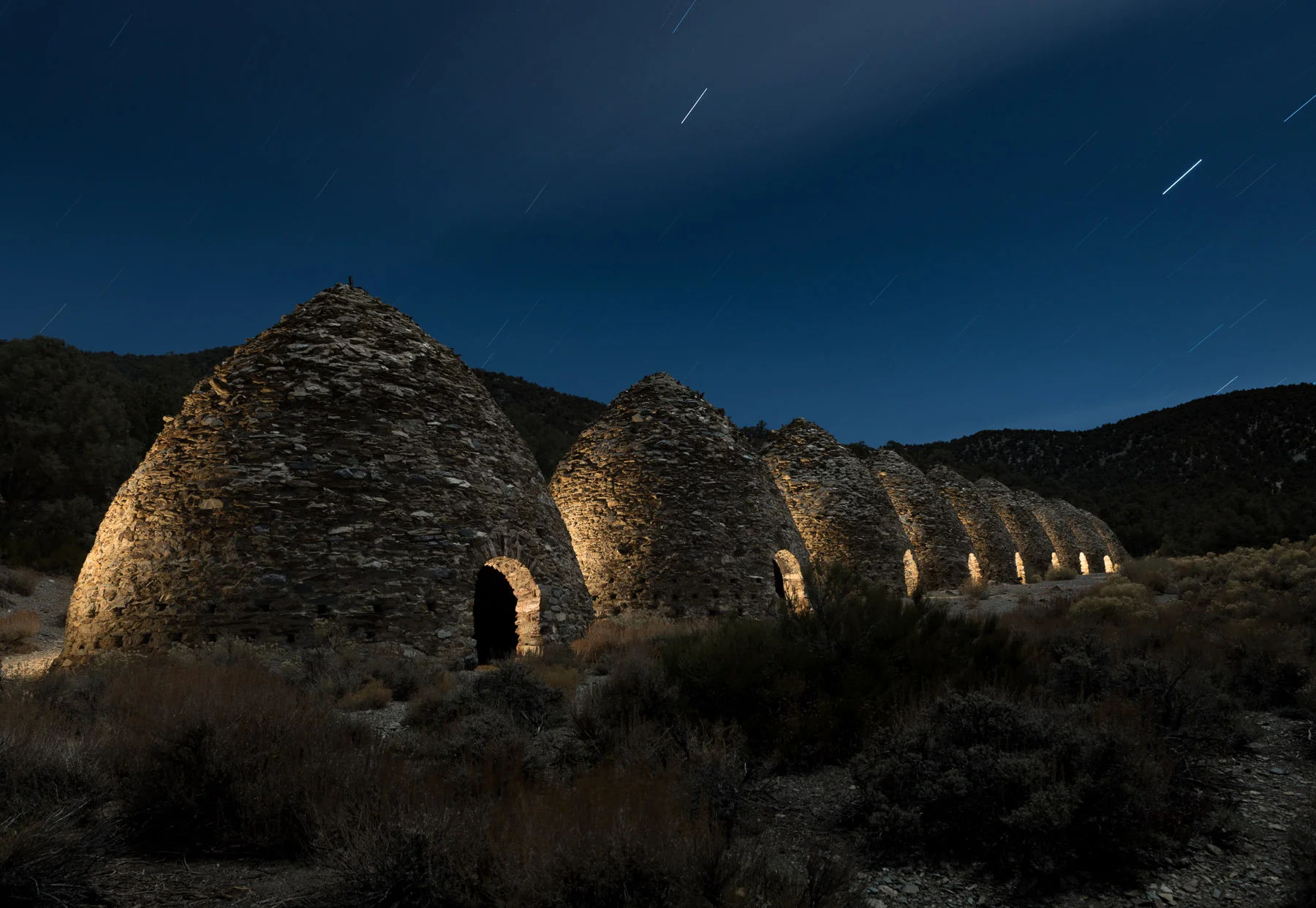 Figure 3. The second and third attempts to light the kilns yielded almost identical images, and the third is the final version. Each kiln was lit from the left rear for about 15 seconds, and from the interior, with the light facing outward, for about 10 seconds. I made minimal adjustments in Lightroom to the single RAW file, including vertical perspective correction. 8 minutes and 38 seconds, f/9, ISO 64.