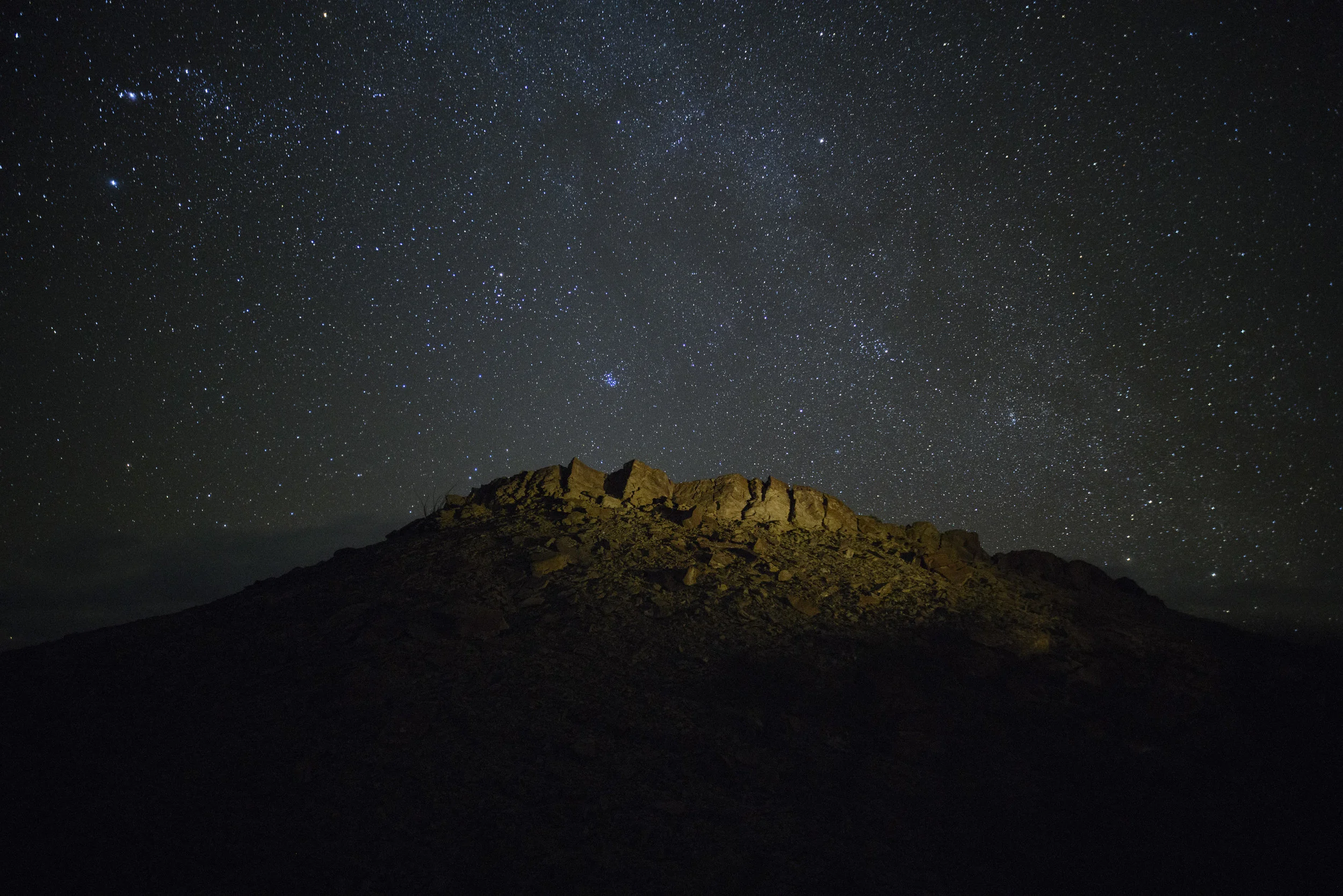 For this photo in Big Bend National Park, the rock ridge was far enough away so that I knew I could focus on infinity and get everything sharp. So I did the easiest thing possible: I used a manual-focus prime lens (in this case, the Irix 15mm f/2.4 ) and moved the focus ring to the infinity mark (which, with this lens, clicks into that setting). Nikon D850 . 20 seconds, f/2.8, ISO 6400.