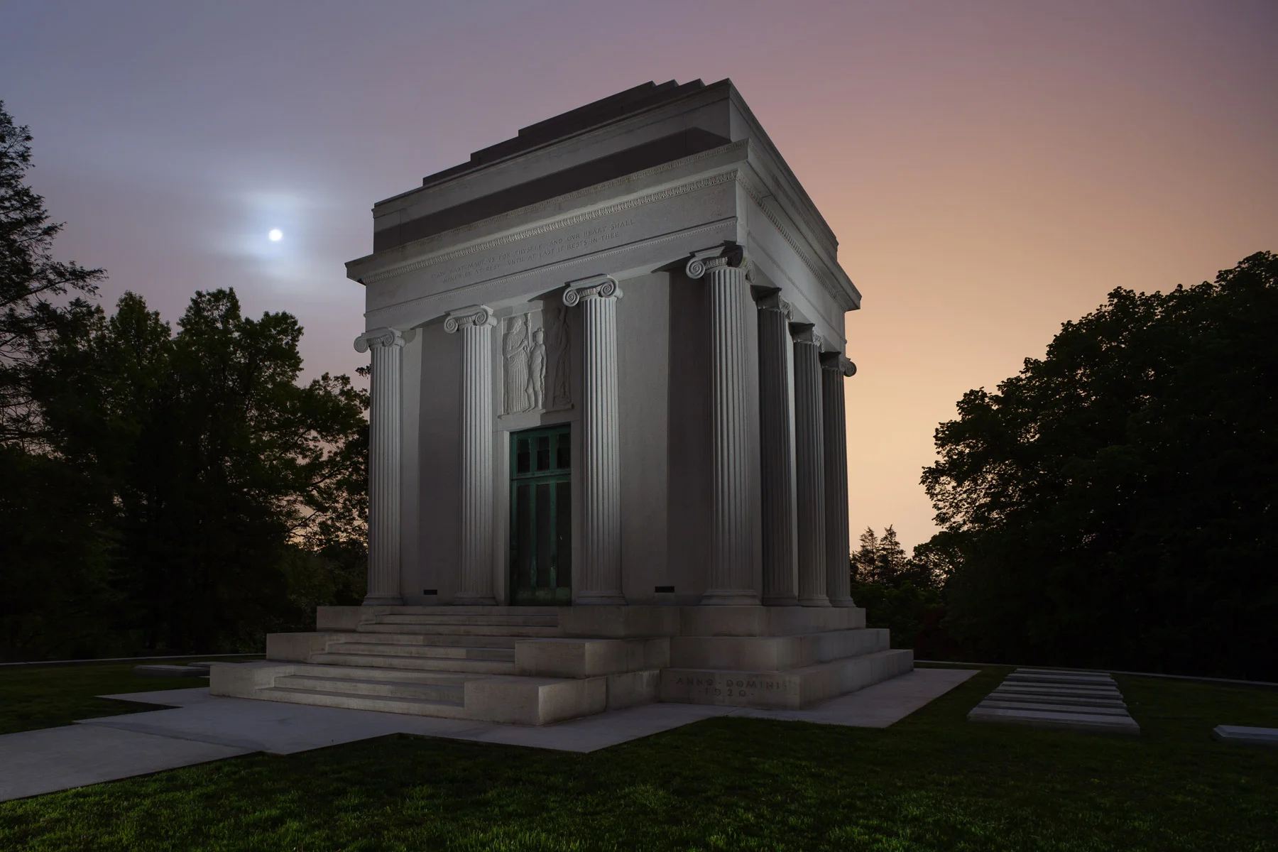 The Rockefeller Crypt at Sleepy Hollow in Tarrytown cost $2 million to construct in 1920. That would be about $22.5 million in today’s dollar. That’s a lot of money to house the family after they are dead and gone, but when your name is Rockefeller, you can afford it. Shot in 2012, with varying cloud cover reflecting mixed streetlighting from Tarrytown and the Tappan Zee Bridge, the combination of which is responsible for the color in the sky. The monument was lit from left, right and low to the ground with a Surefire G2 incandescent flashlight for three of the four minutes during the exposure. Canon 5D Mark II and an adapted Nikon 28mm f/3.5 PC lens. 4 minutes, f/8, ISO 100, with a second, shorter exposure for the moon.