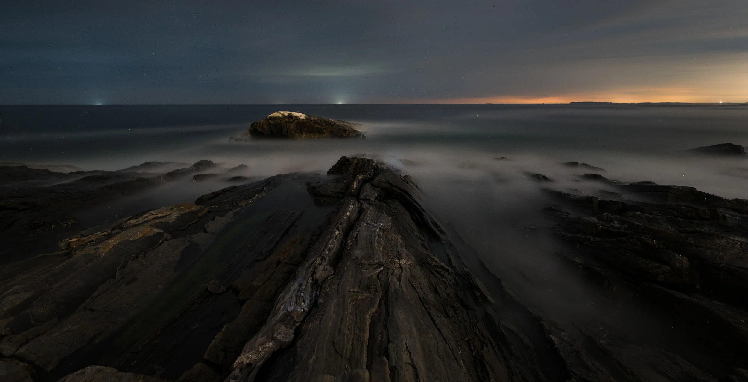 Pemaquid Point, Maine, sharp from front to back after focusing to a hyperfocal distance of 18 feet. Nikon D750 , Sigma 24mm f/4 lens. 488 seconds, f/3.5, ISO 800.