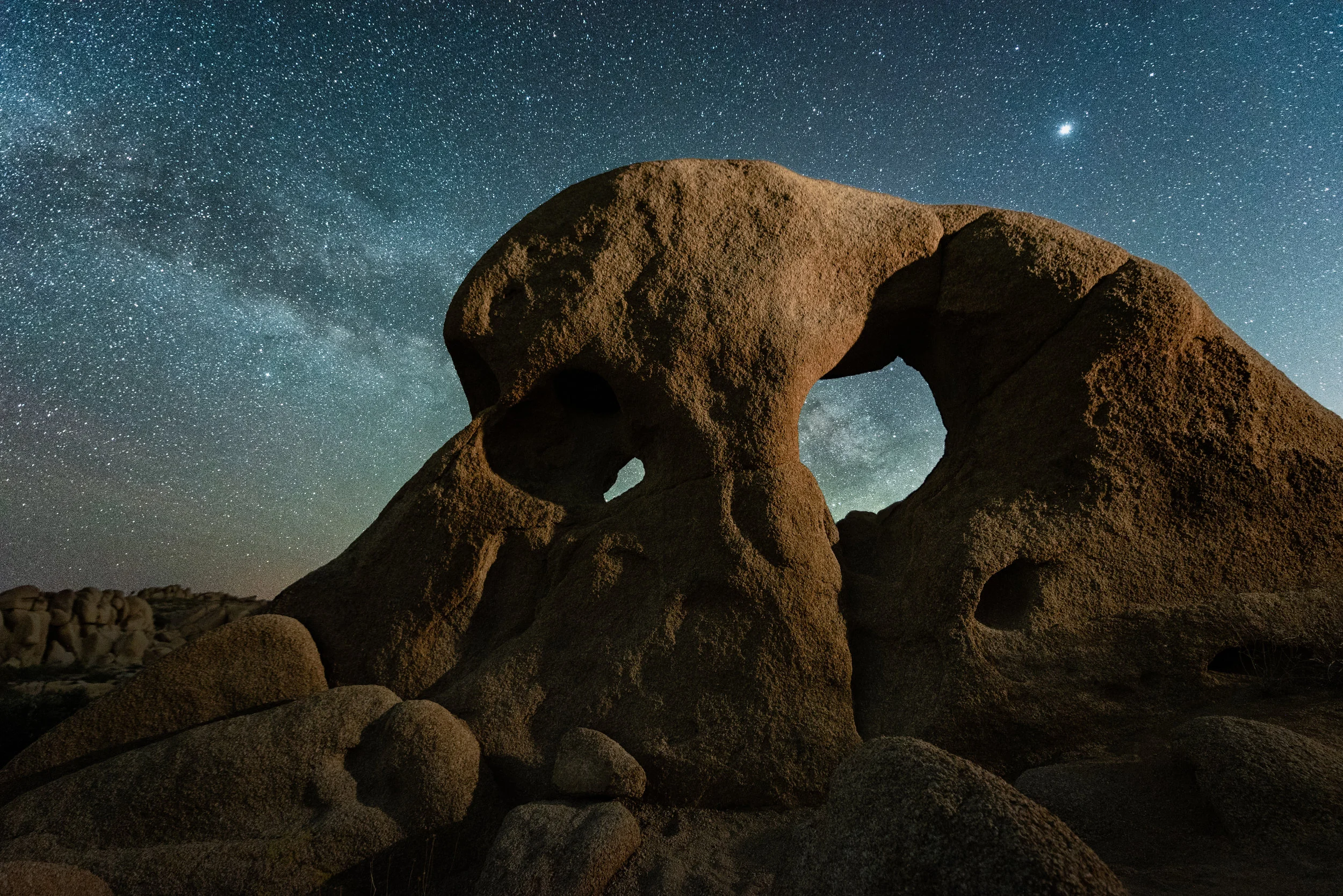 Reality is Outside the Skull. Nikon D750 , Nikon 14-24mm f/2.8 lens. Light painting exposure: 80 seconds, f/2.8, ISO 1600, painted with a Coast HP5R ; star exposure: eight frames at 15 seconds, f/2.8, ISO 10,000 blended in Starry Landscape Stacker.