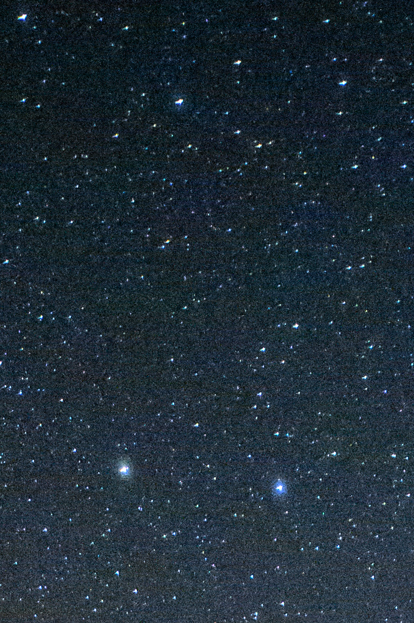 Note the distortion in the brighter stars—they look like UFOs with a bright line intersecting them. This is called “coma’ and is found in many lenses. You can correct for coma by closing down your lens 1 to 3 stops.