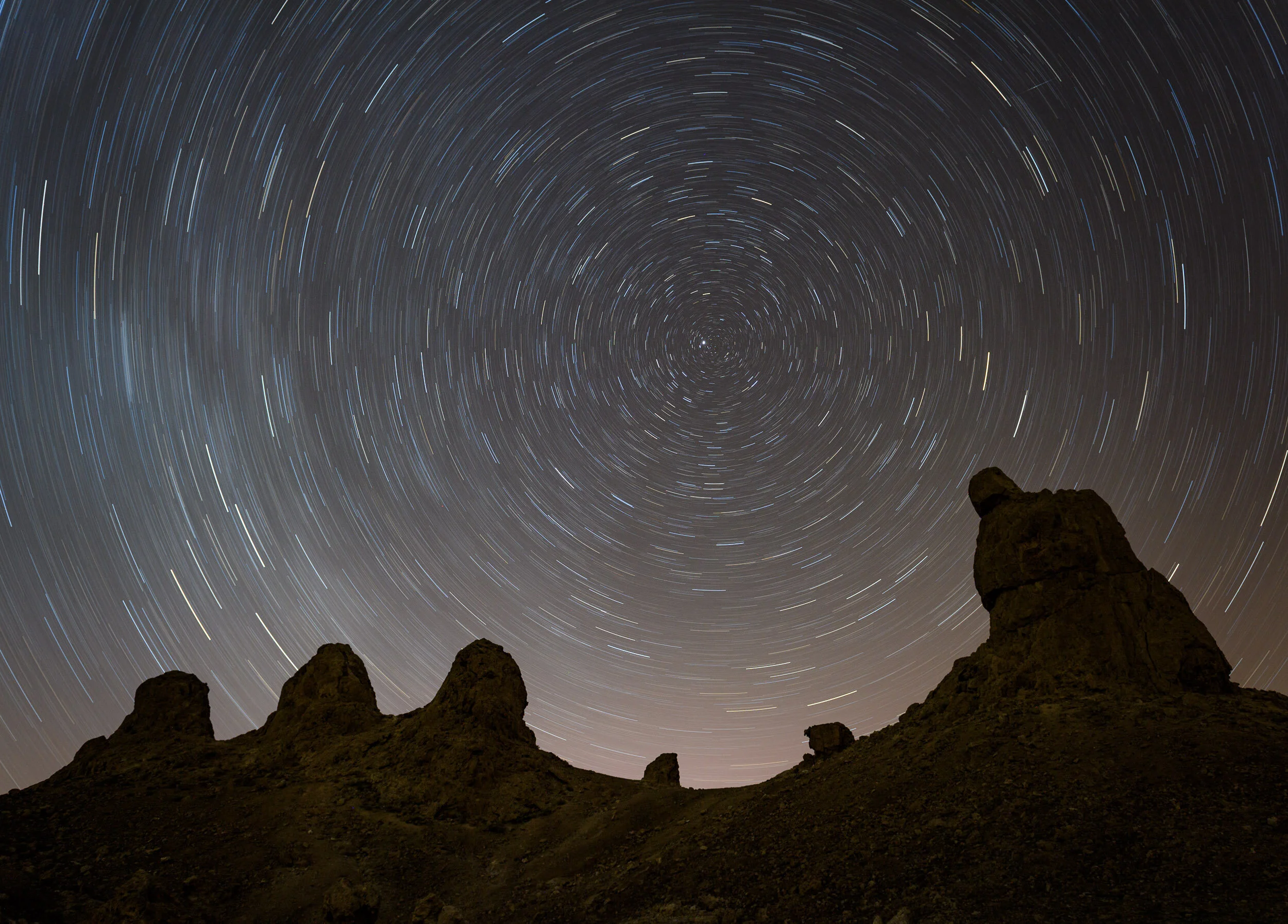 Star Circles over Trona Pinnacles, California. Nikon D5 with a Nikon 24-70mm f/2.8 lens. 31 minutes, f/4, ISO 100.