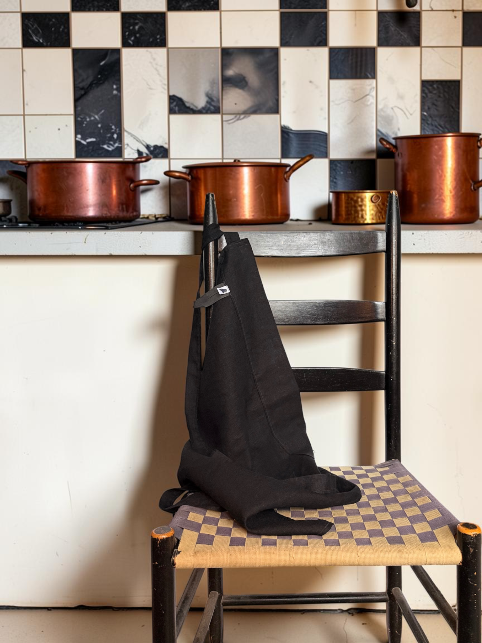 IMG_3924-aprons-draped-by-shelf.png