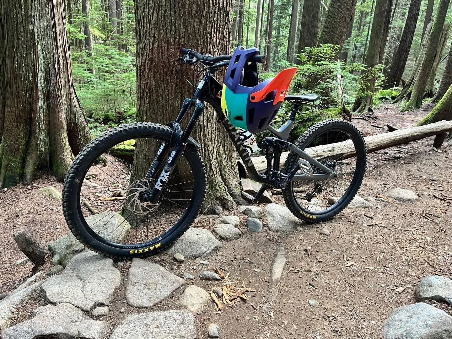 My bike at the entrance to John Deer trail on Mt Seymour. Fans of my last post (about bike helmets) will note the enormous full face helmet hanging from the bars. This was my second &ldquo;recovery ride&rdquo; since the accident. John Deer presented 