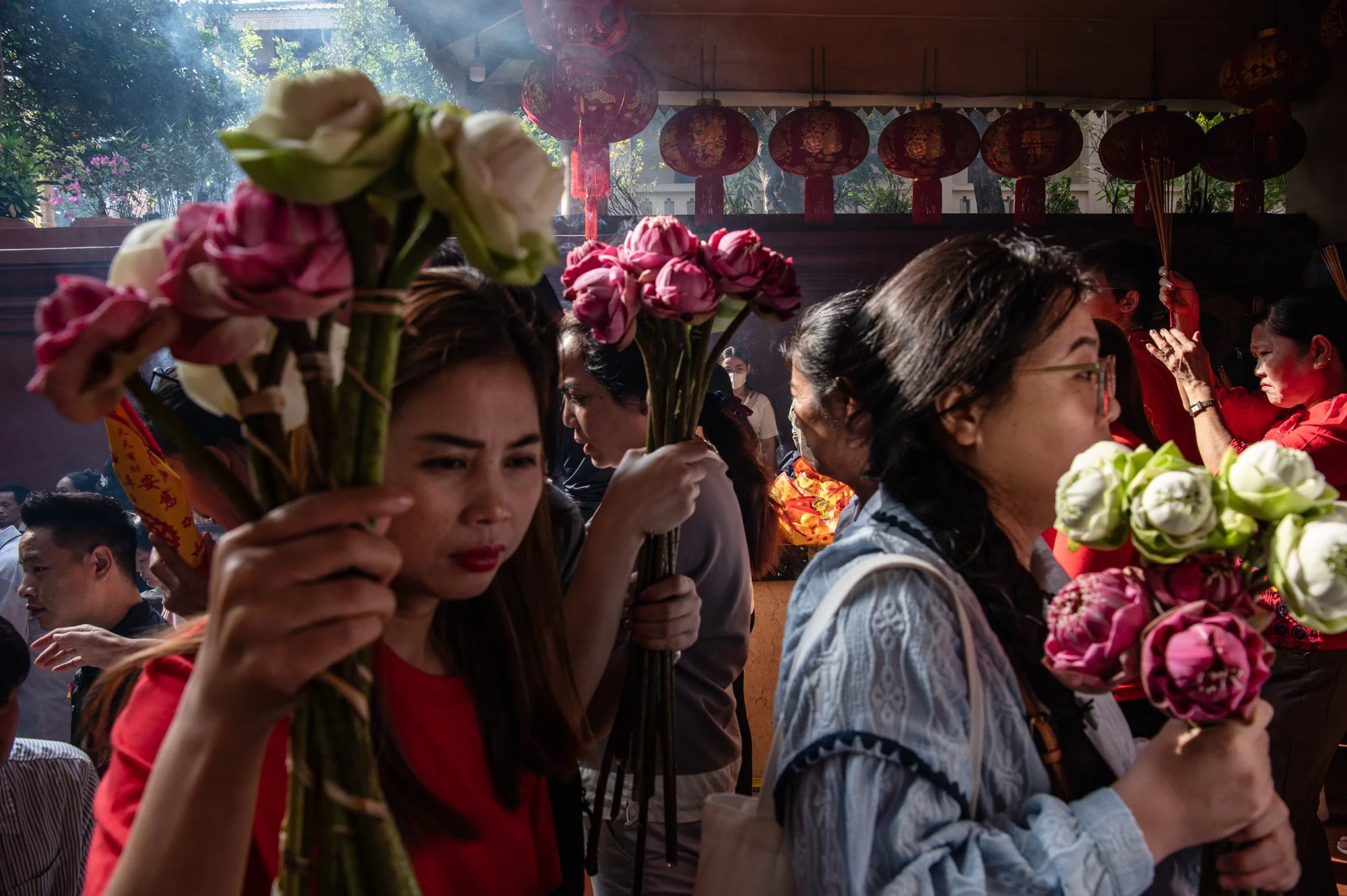  People gather to celebrate Chinese Lunar New Year at Wat Phnom temple in Phnom Penh, Cambodia. 