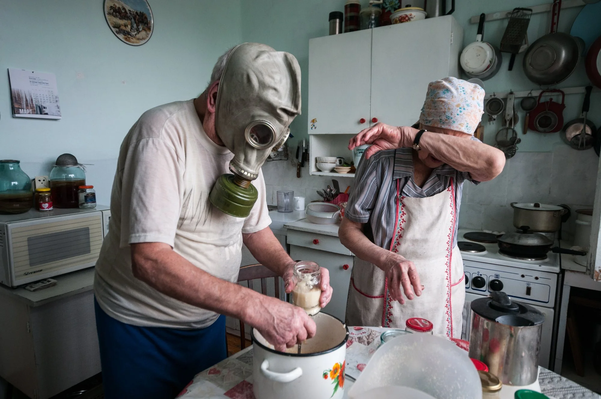 My grandparents prepare horseradish in their apartment in Novokuznetsk, Siberia. Horseradish, also known as khren, is a very popular Russian traditional spicy condiment, usually served with meat courses. While preparing horseradish, people use all ki
