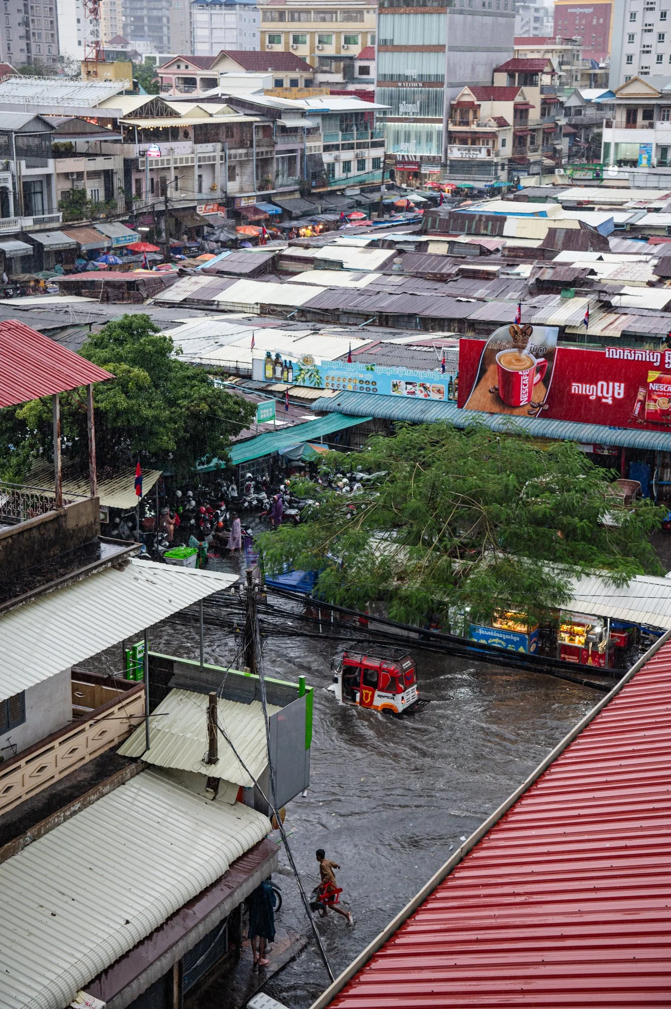 Severe rains cause floods and disrupt traffic every year during the rainy season in Phnom Penh, Cambodia.
