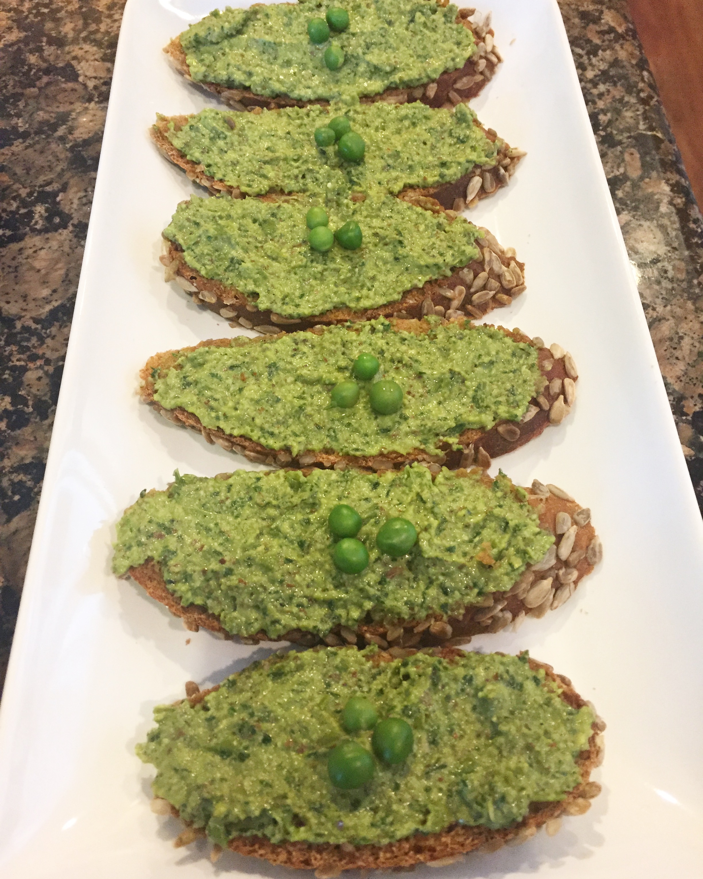 Spring pea/basil pesto on sunflower seed bread, served alongside the soup.