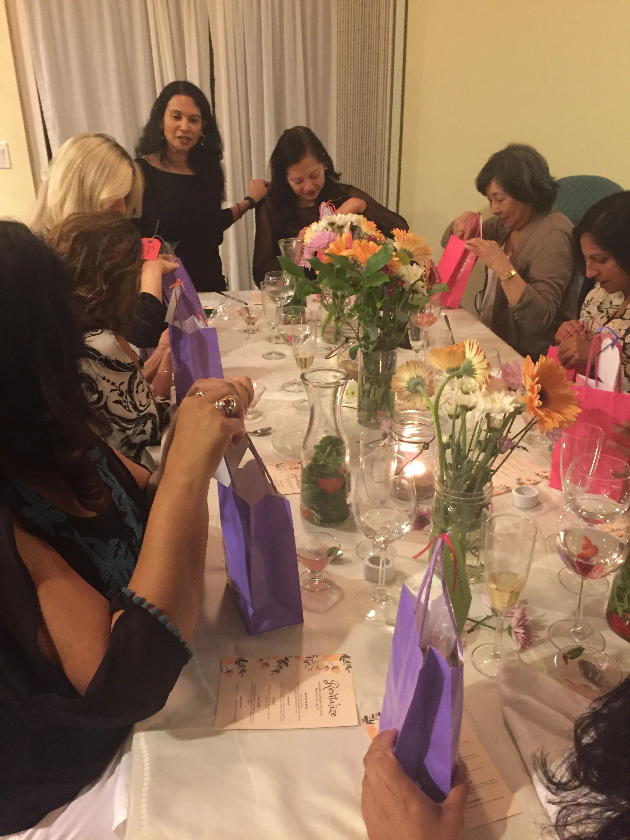 Always the highlight of the evening...passing out everyone's personalized gift bag, filled with homemade goodies from the night. Each guest also took home a potted herb plant, celebrating spring!