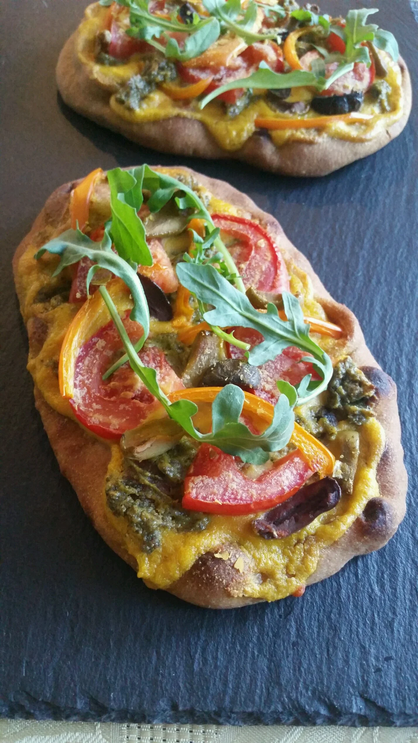 Vegetable pizza naan using cashew cream. This cheese is so versatile!
