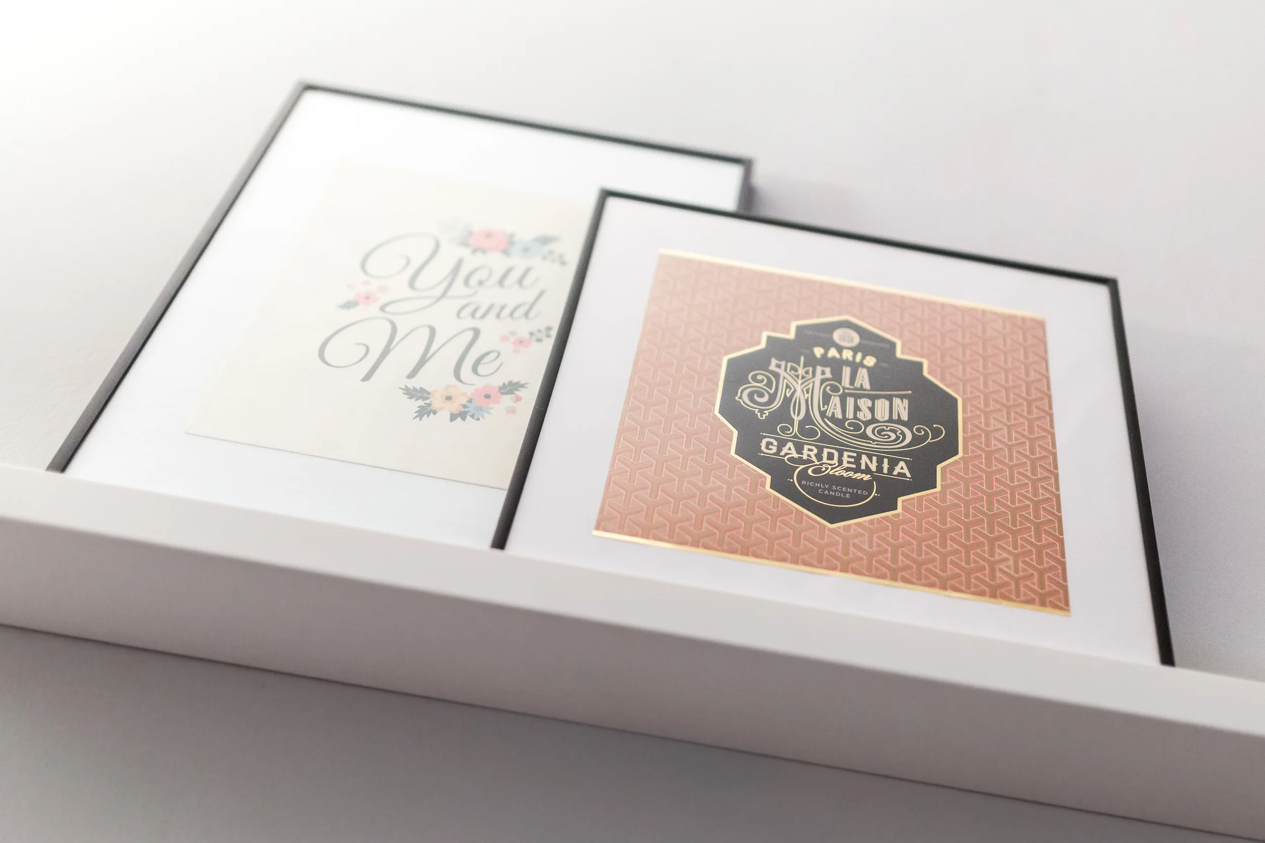 kaboompics.com_Posters in frames on a white wall.jpg