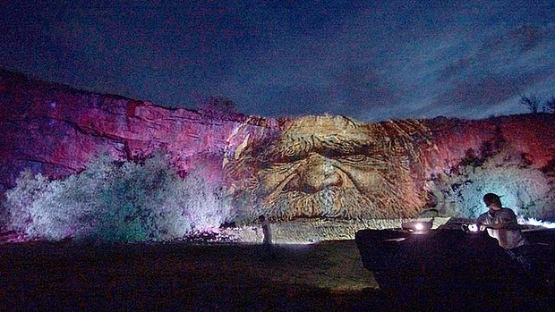 Images are projected on the wall of a quarry in Dookie, Victoria. Photo: Serana Hunt