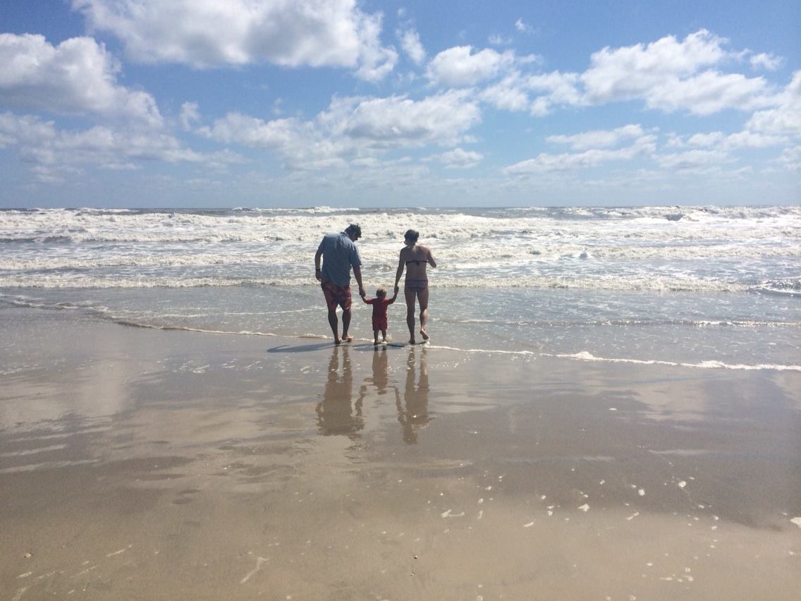 August 9 . So...traffic into the Outer Banks on a weekend is no joke. Also no joke? The giggles out of this little guy as he jumped his first waves.