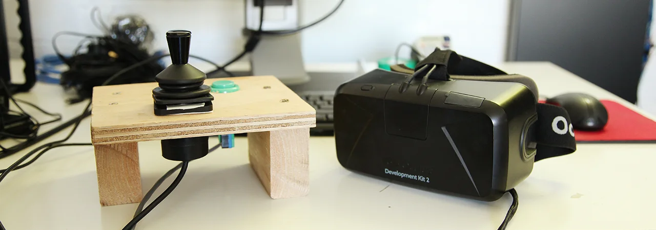 The Oculus DK2 and the rough joystick/button setup which was made for us by Interactive Controls.