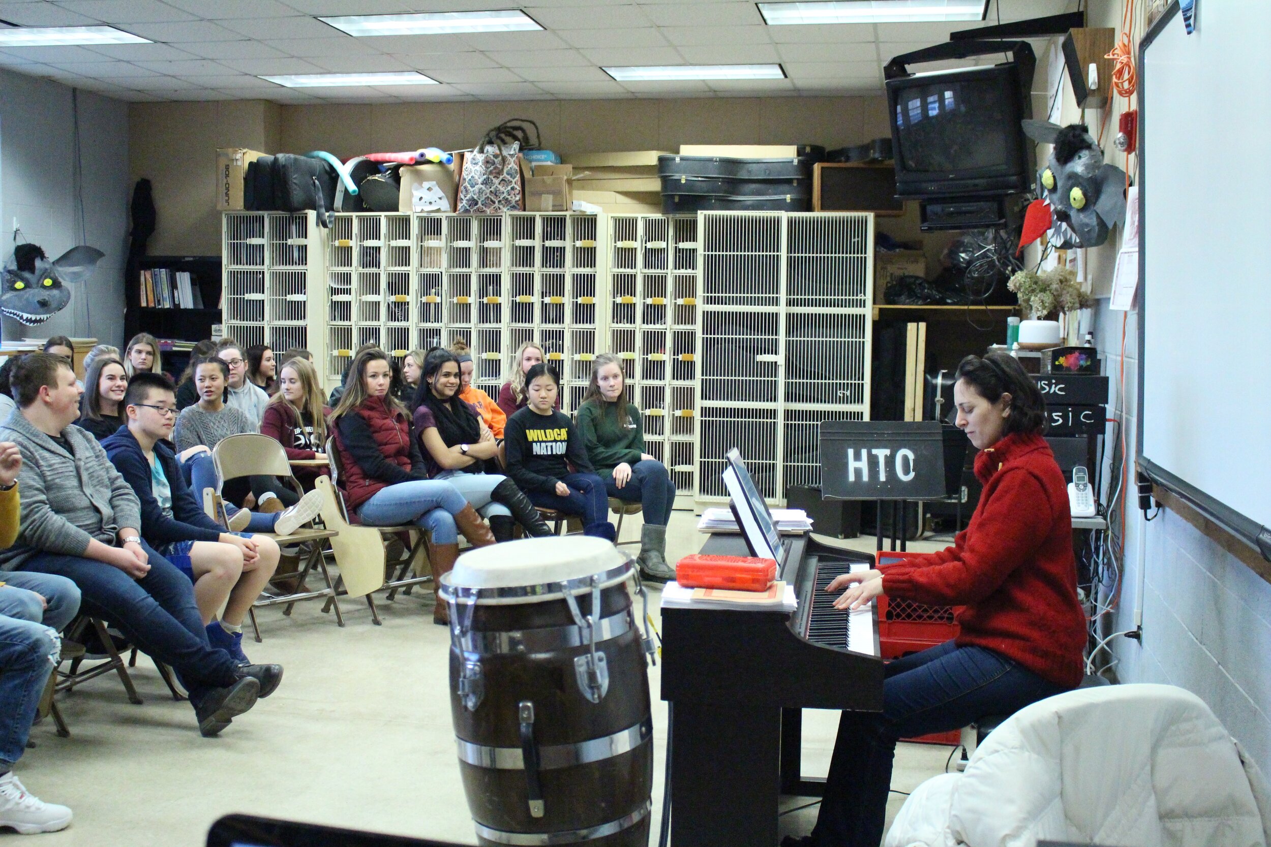 Renana Gutman plays Chopin for high school students.jpg