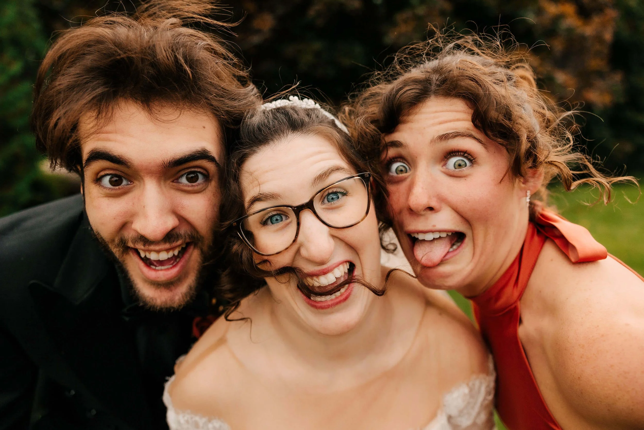 GAUPERphoto Northern Michigan wedding photographer candid bride and guests silly faces outdoor, Willowbrook Mill Northport top Michigan wedding photography