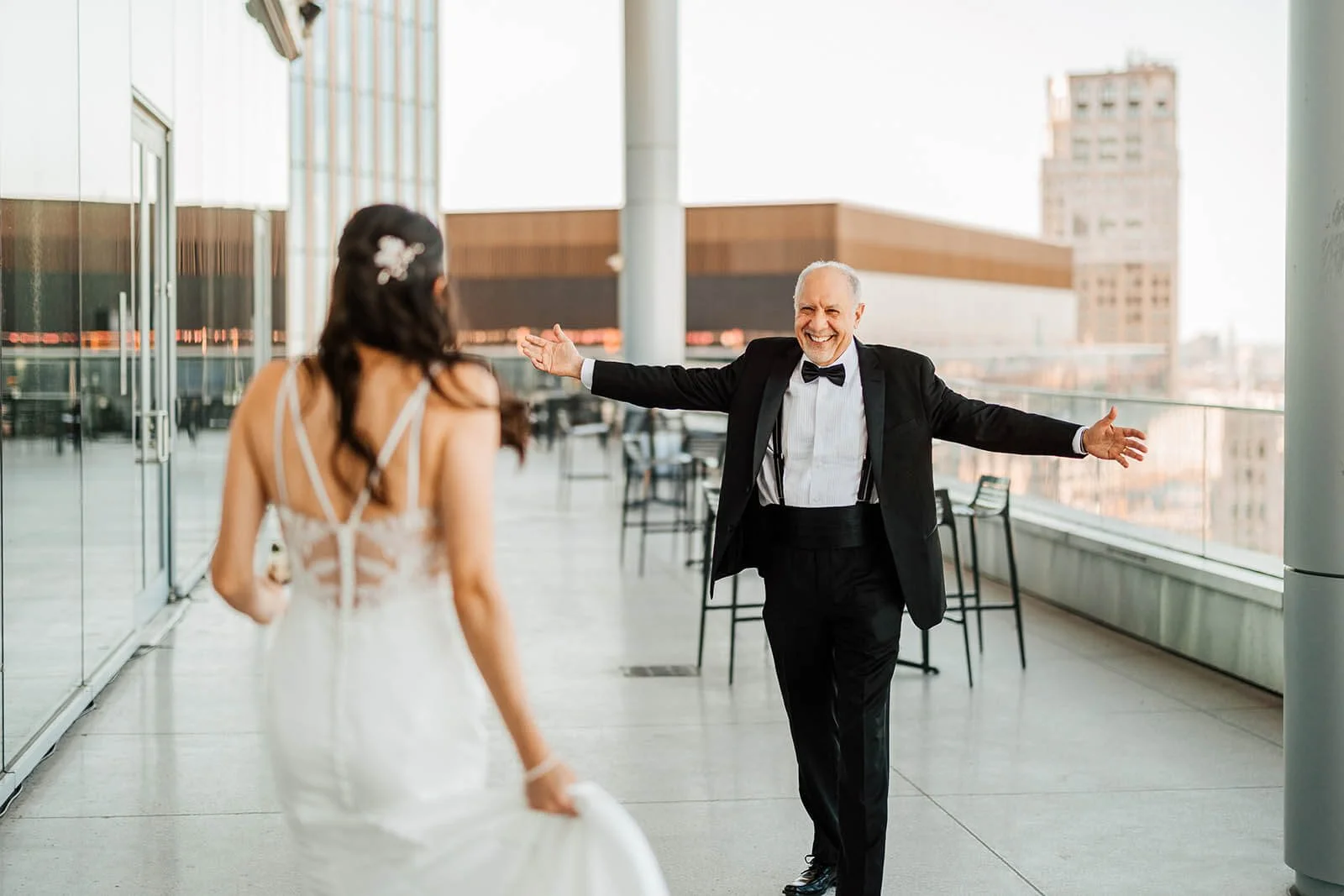 Top Detroit wedding photographer candid father of bride emotional first look rooftop, Elevate One Campus Martius downtown Michigan