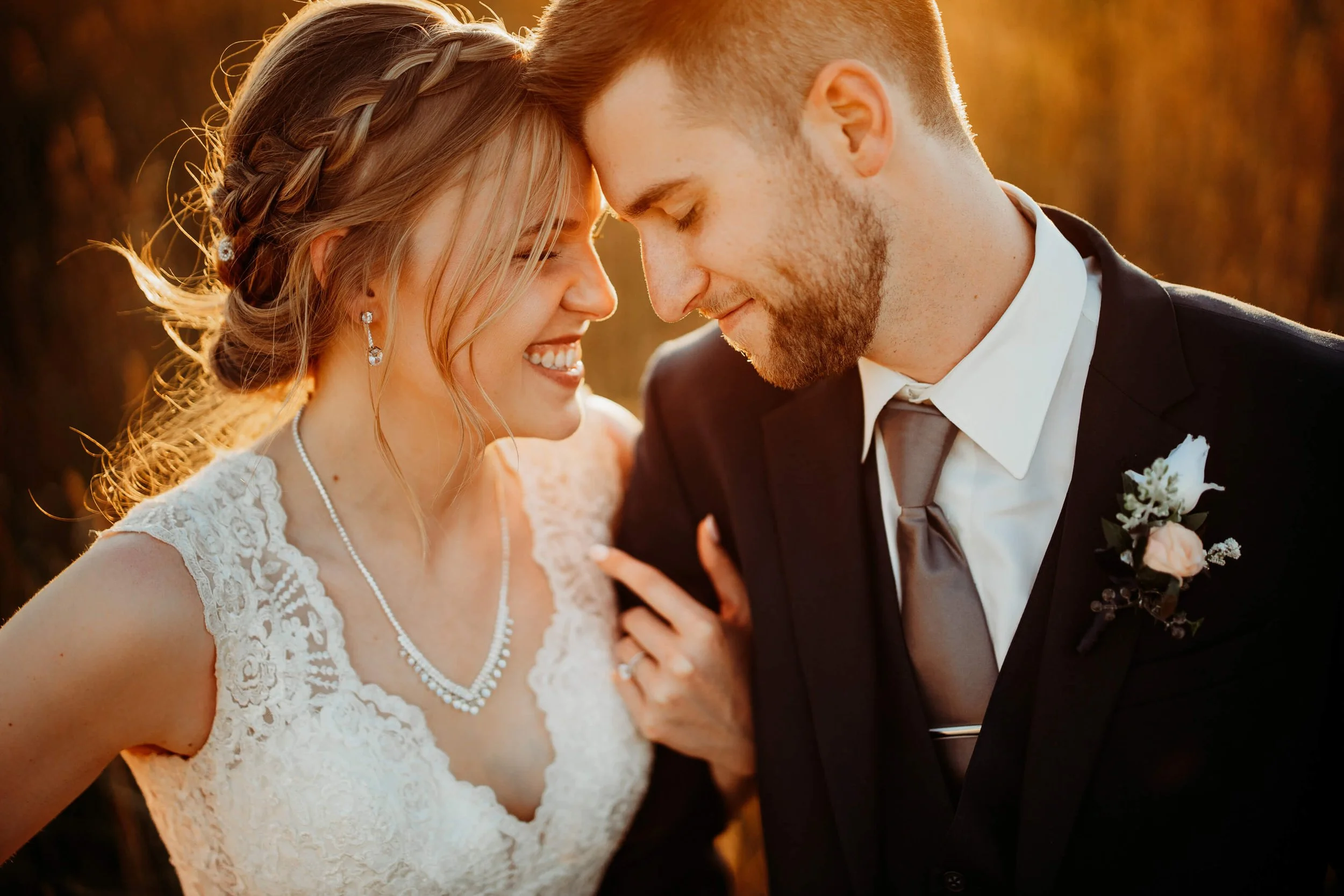 Best Northern Michigan wedding photographer golden hour bride and groom forehead touch portrait, Sonshine Barn wedding Gaylord Michigan GAUPERphoto