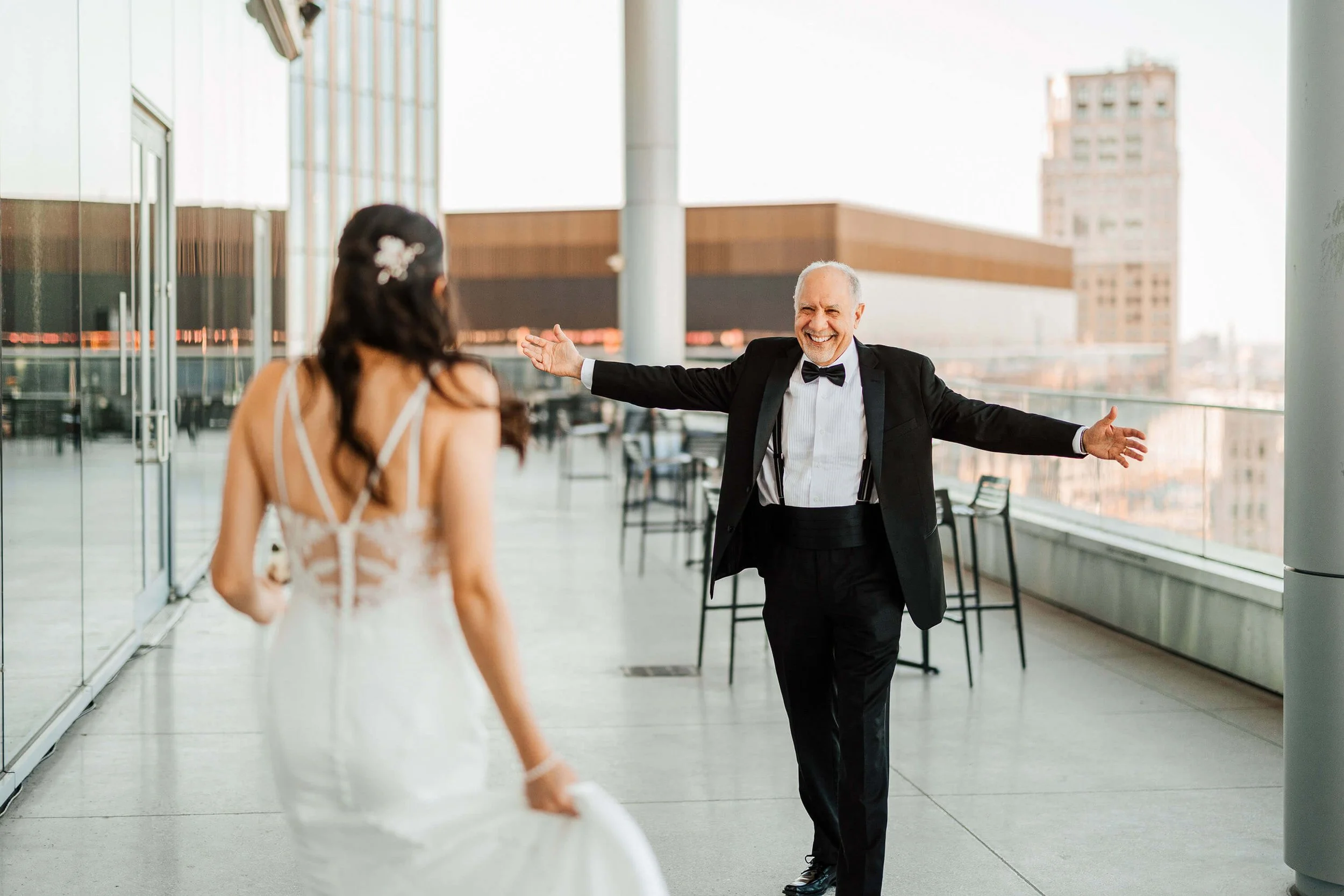 Top Detroit wedding photographer candid father of bride emotional first look rooftop, Elevate One Campus Martius downtown Michigan