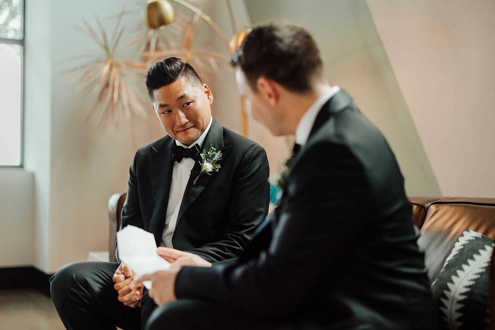 GAUPERphoto West Michigan wedding photographer groom reading emotional letter during getting ready, documentary wedding photography Grand Rapids