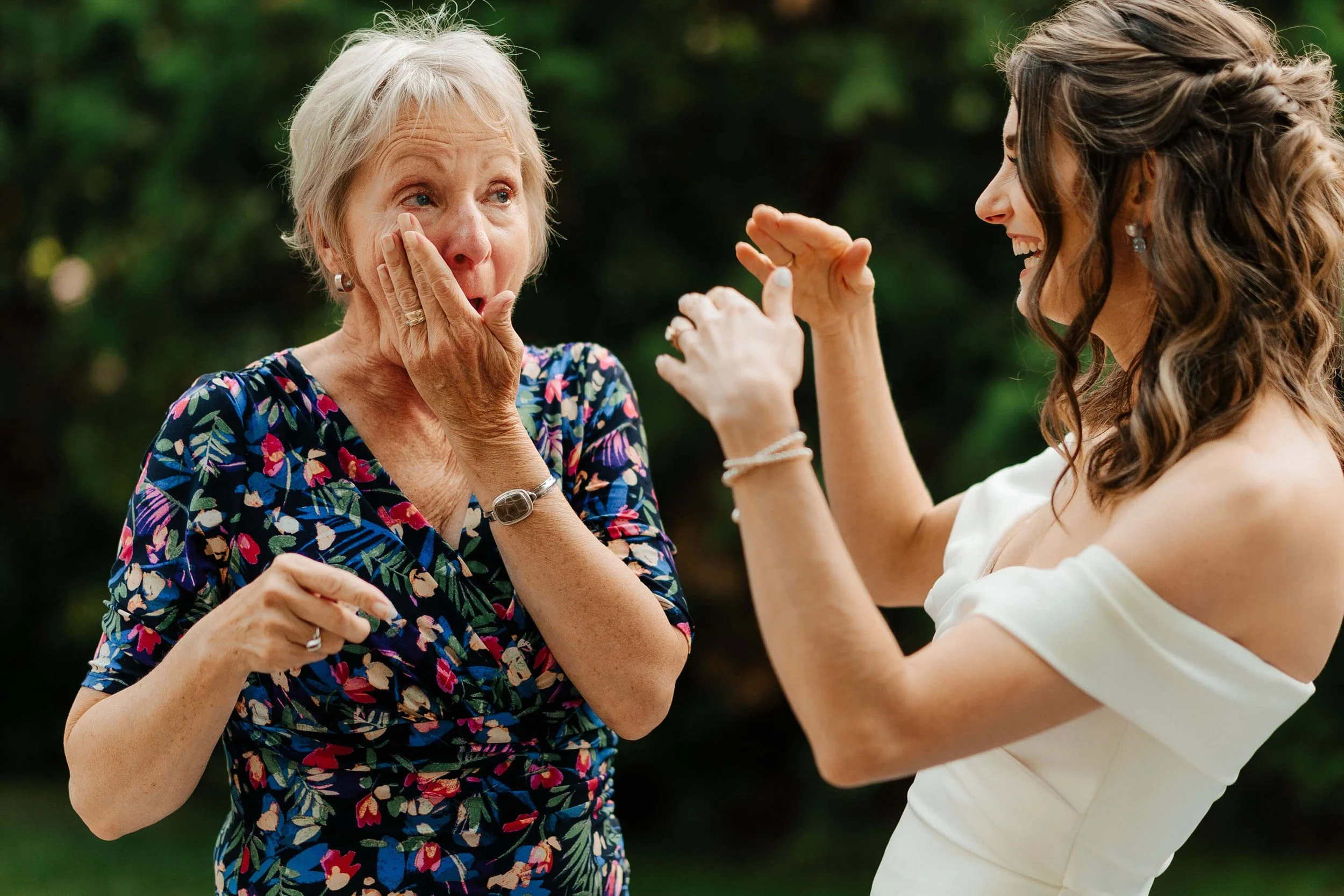 Harbor Springs Michigan wedding photographer candid emotional mother of bride first look outdoor, top Northern Michigan documentary wedding photography