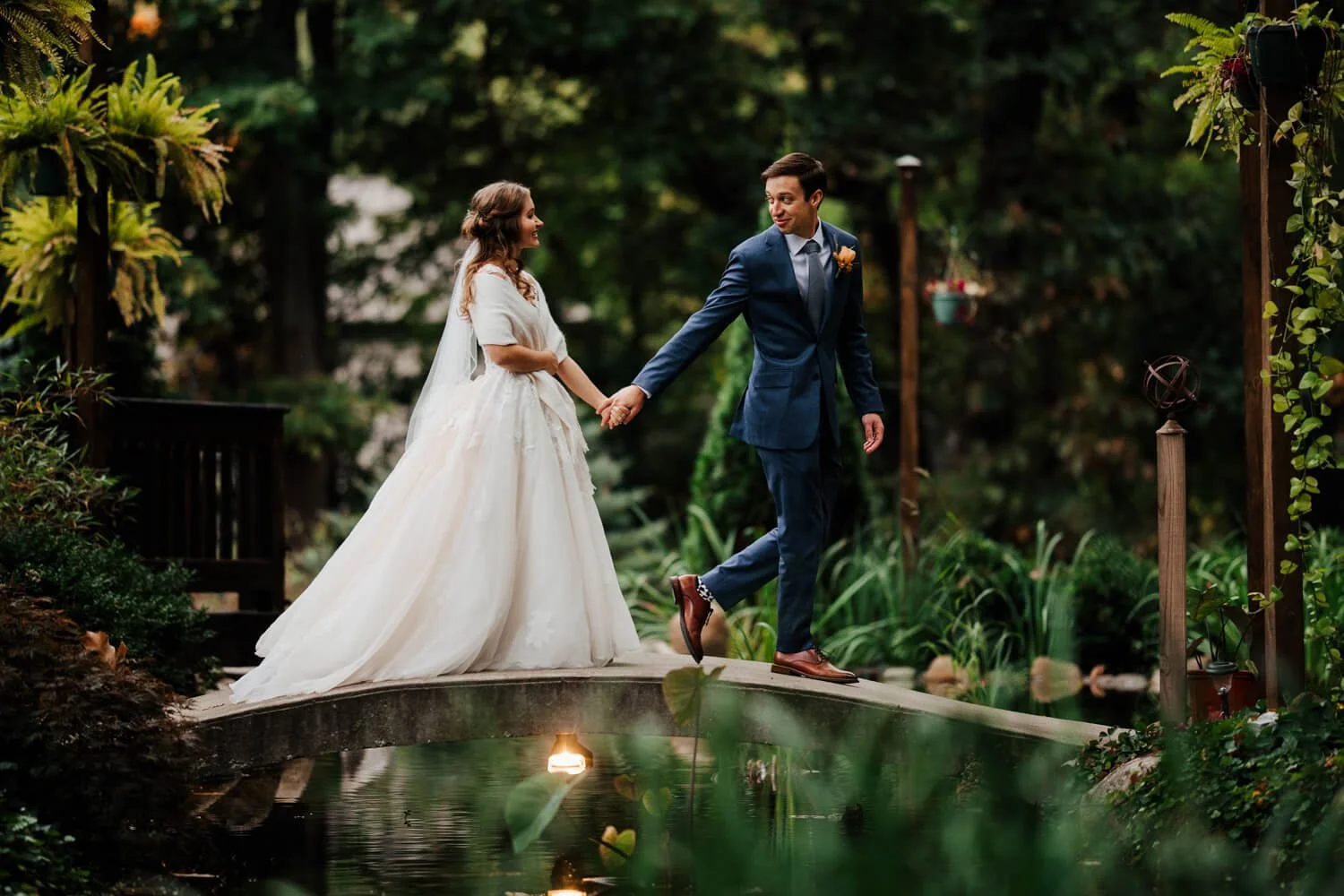 Bride and groom sharing a kiss during outdoor wedding portraits at Hoffmaster State Park in Muskegon, Michigan