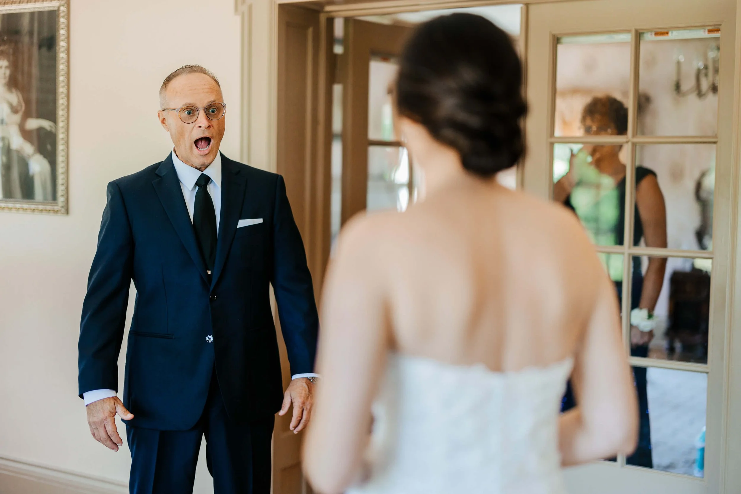Felt Estate wedding photographer Saugatuck Michigan candid father of bride shocked jaw drop emotional first look reaction indoors, top West Michigan luxury wedding photography