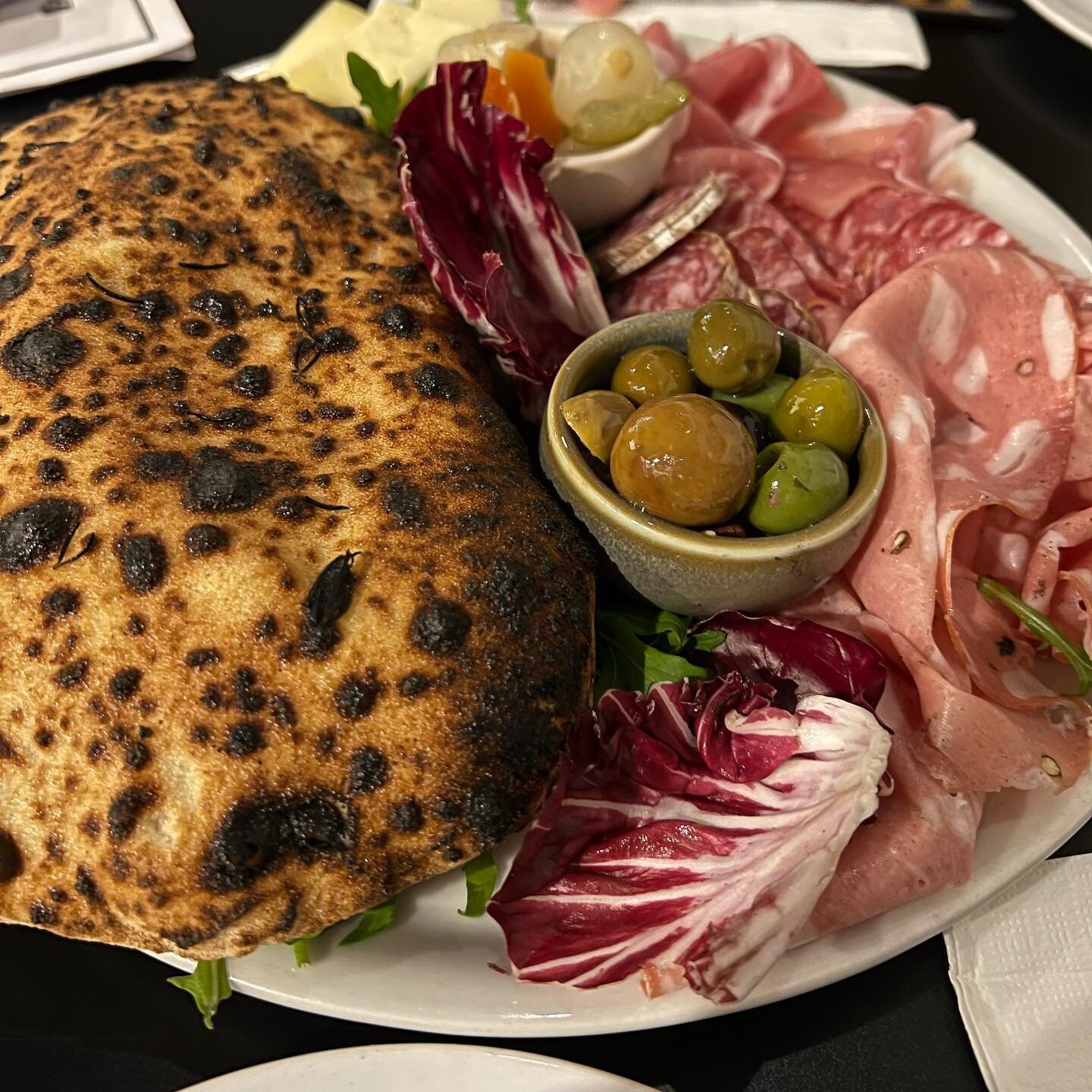 Charcuterie share plate, Asiago cheese, pickles, olives, and our homemade wood fired ciabatta bread - what better way to start your weekend? #sharefood #pizzeriavioletta

Let us know if you prefer our  cosy outdoor seating with heaters when you book.