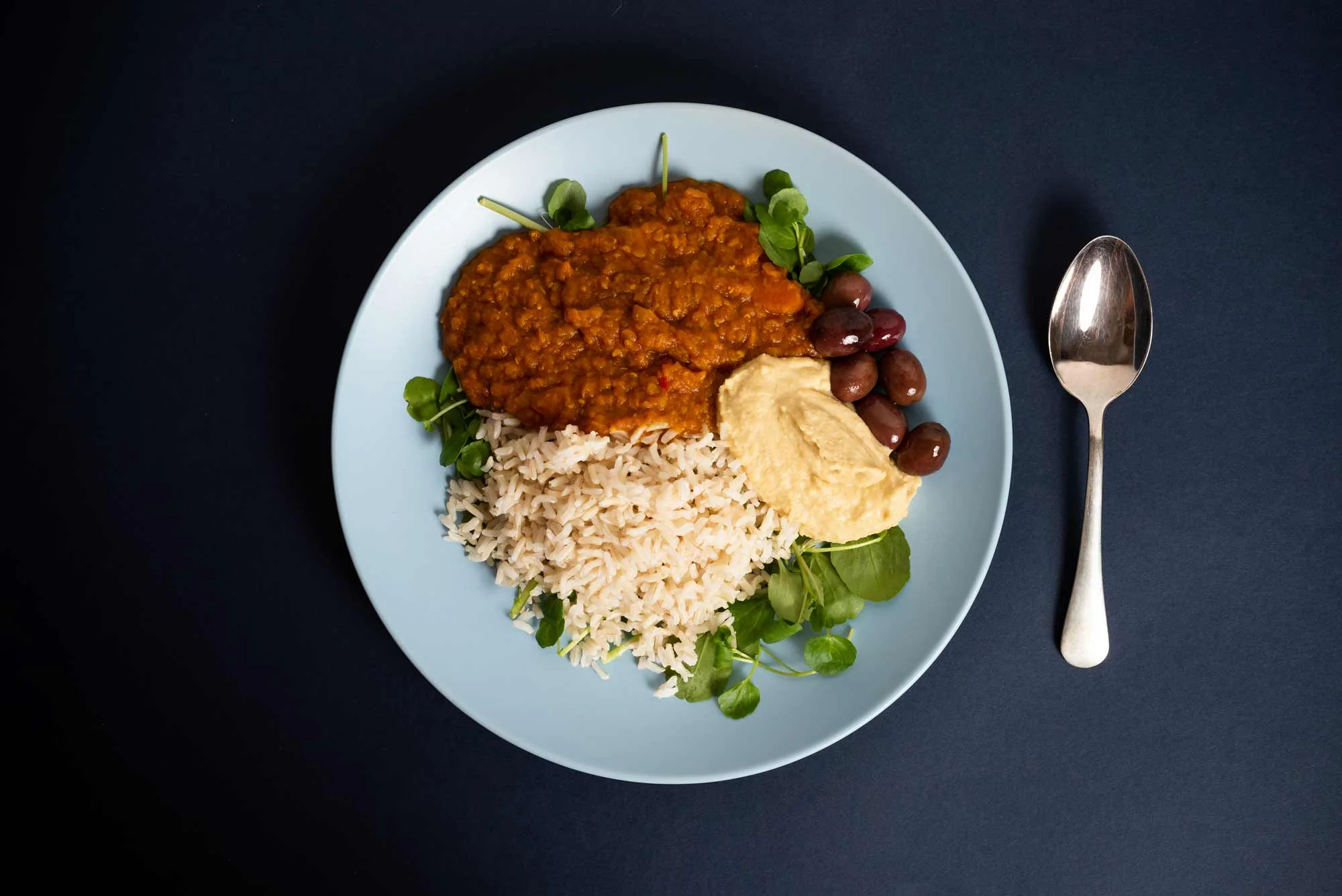 Served here with watercress, hummus and olives.