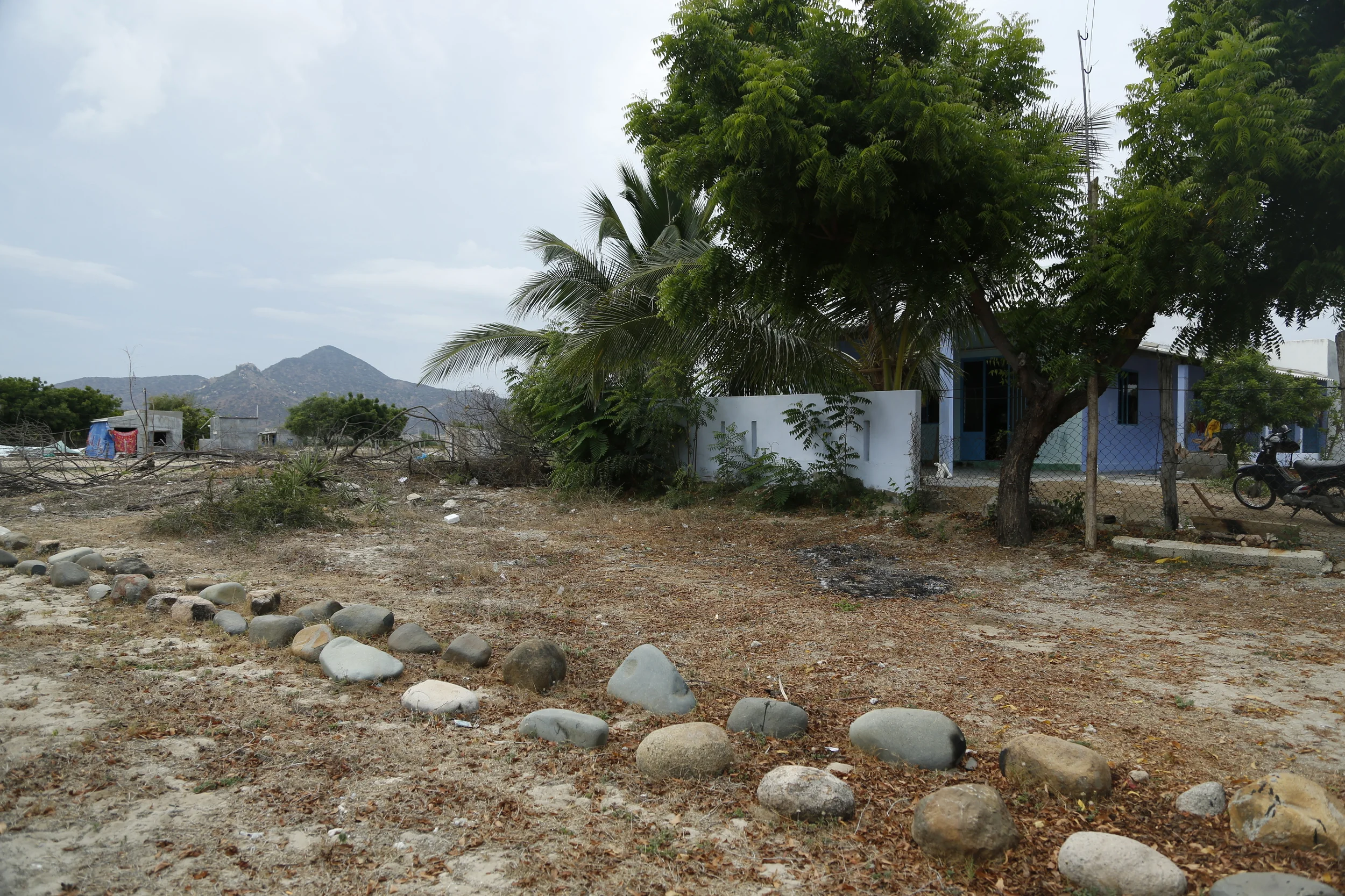 Houses are built in the area of cemetery. They remove the stones to built houses on top.