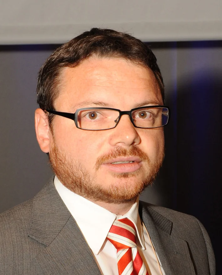 Dr. Florian Auer
